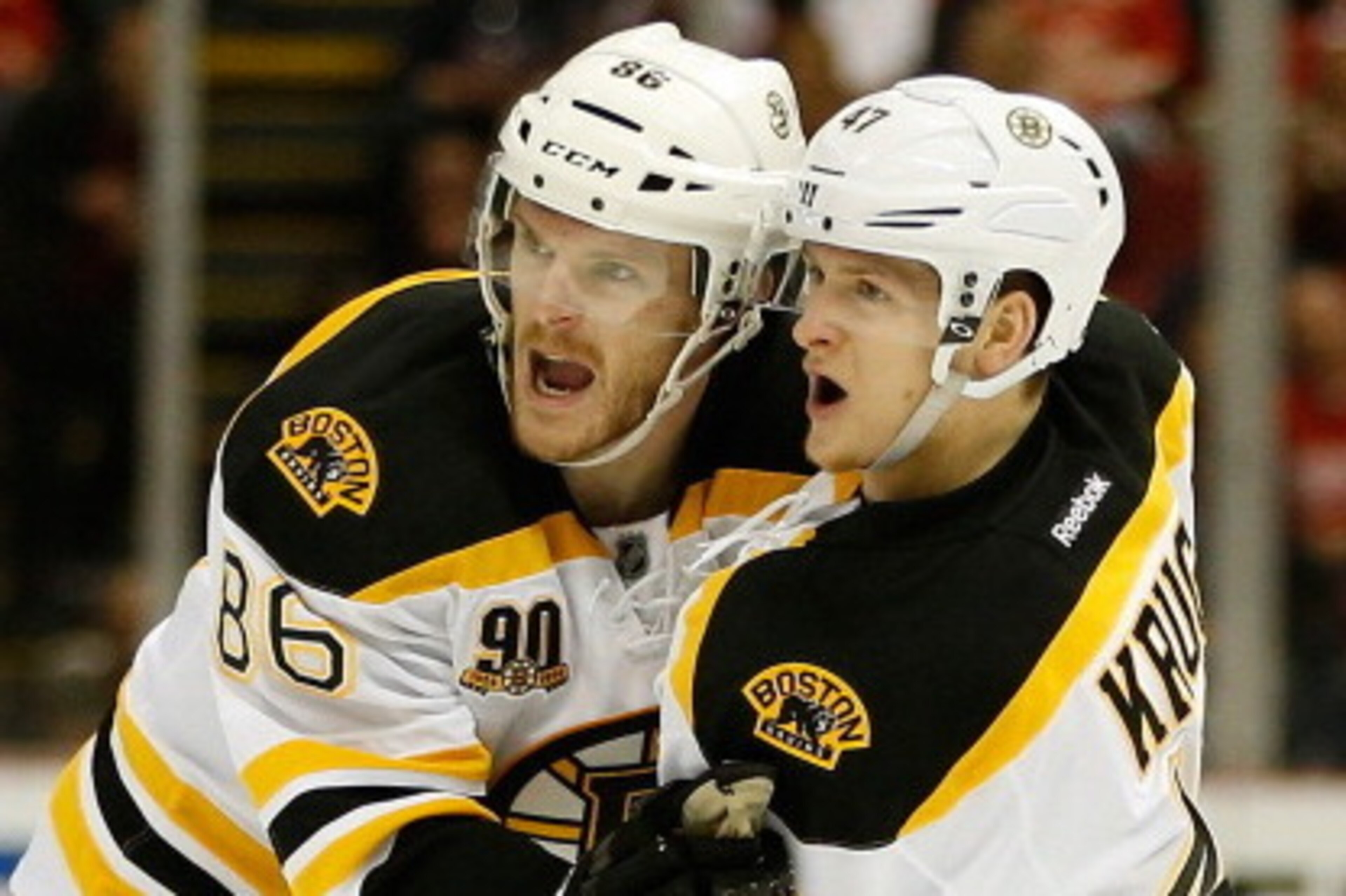 DETROIT, MI - APRIL 24: Torey Krug #47 of the Boston Bruins celebrates his second-period goal with Kevan Miller #86 during action against the Detroit Red Wings in Game Four of the First Round of the 2014 NHL Stanley Cup Playoffs at Joe Louis Arena on Apr DETROIT, MI - APRIL 24: Torey Krug #47 of the Boston Bruins celebrates his second-period goal with Kevan Miller #86 during action against the Detroit Red Wings in Game Four of the First Round of the 2014 NHL Stanley Cup Playoffs at Joe Louis Arena on Apr