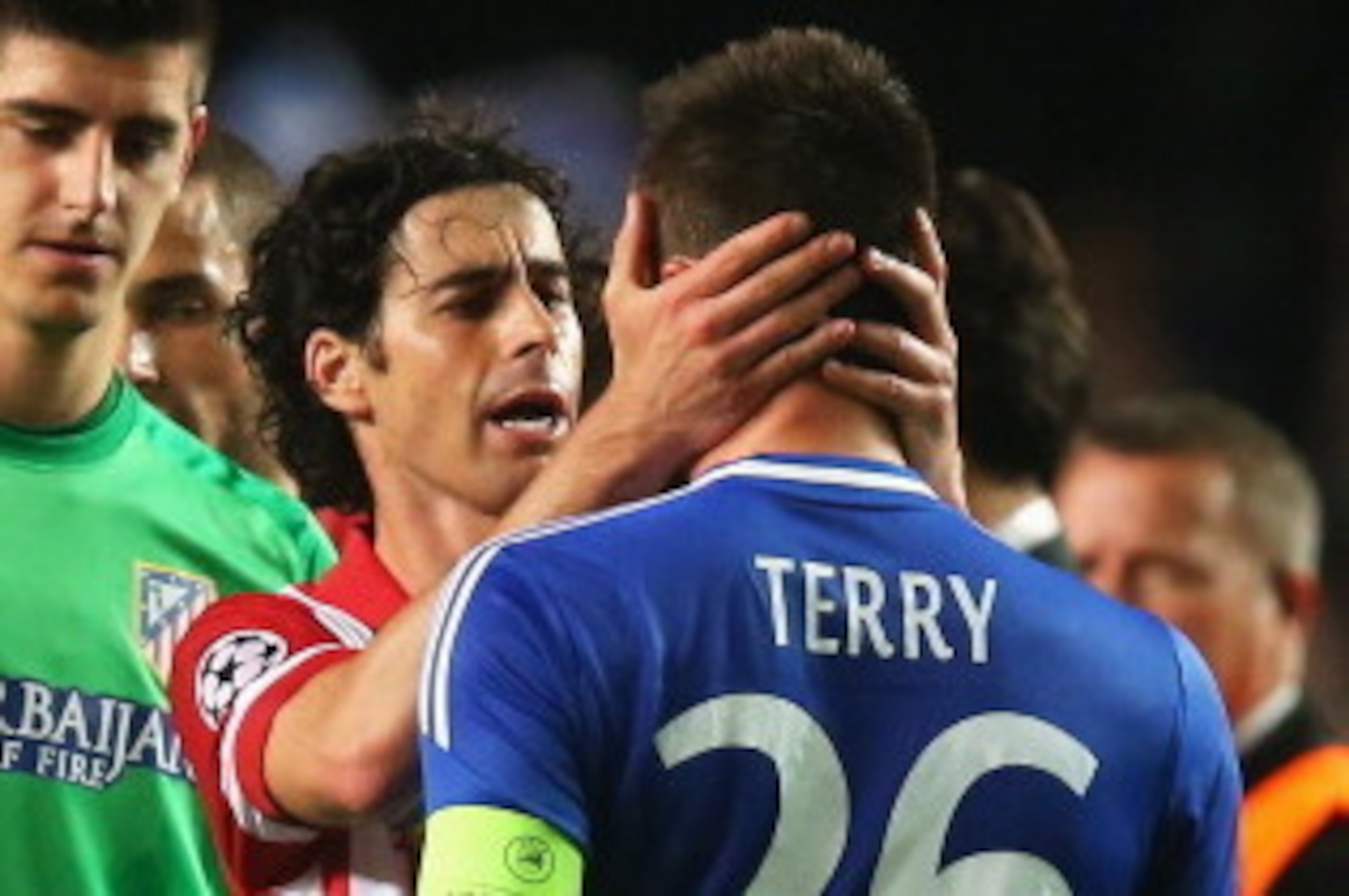 LONDON, ENGLAND - APRIL 30: Tiago of Club Atletico de Madrid consoles John Terry of Chelsea as Thibaut Courtois (L) looks on after the UEFA Champions League semi-final second leg match between Chelsea and Club Atletico de Madrid at Stamford Bridge on Apri