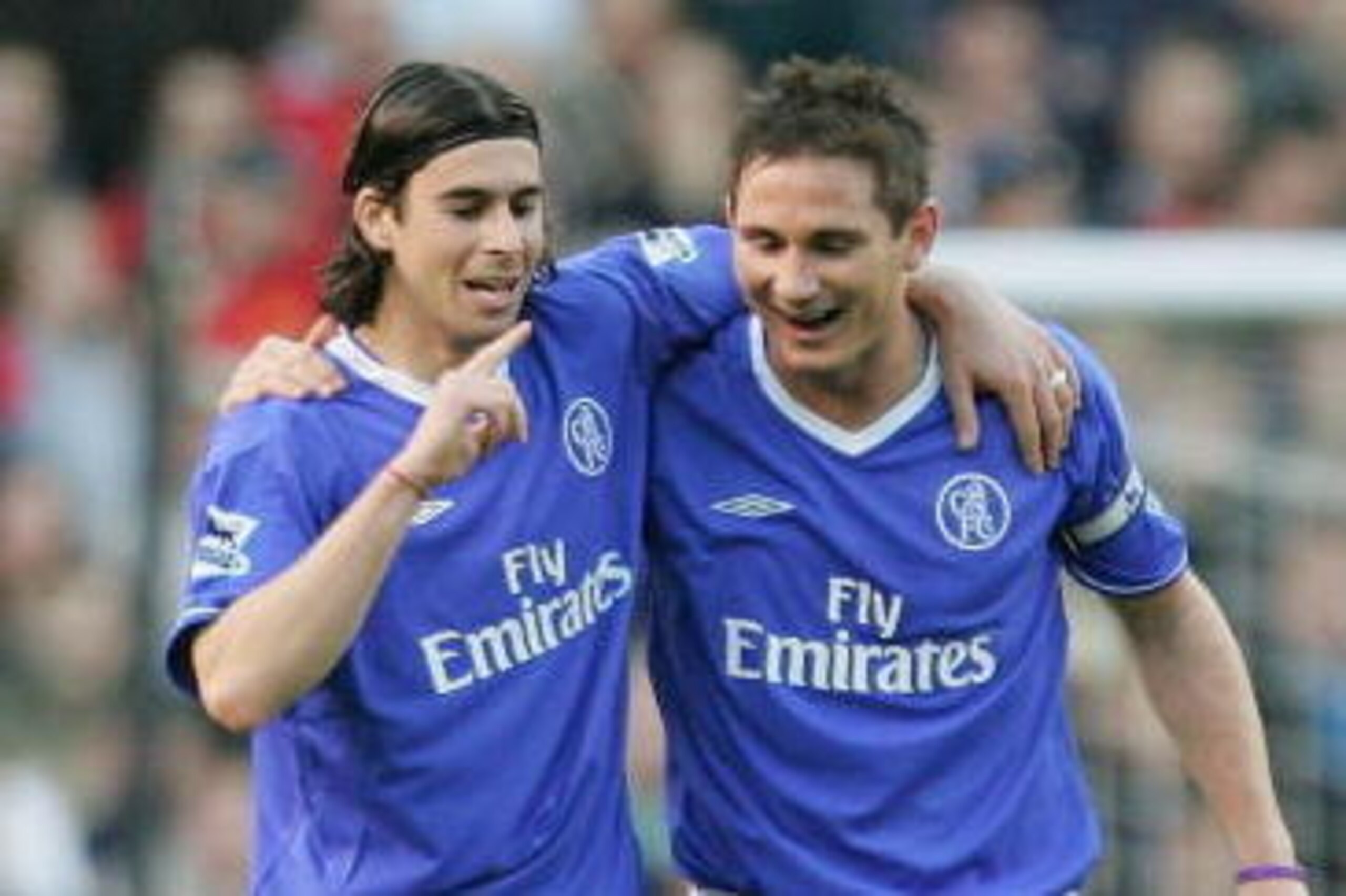 MANCHESTER, UNITED KINGDOM - MAY 10:  (L- R)Tiago of Chelsea is congratulated by team mate Frank Lampard after scoring Chelsea's first goal of the game during the FA Barclays Premiership match between Manchester United and Chelsea at Old Trafford on May 1
