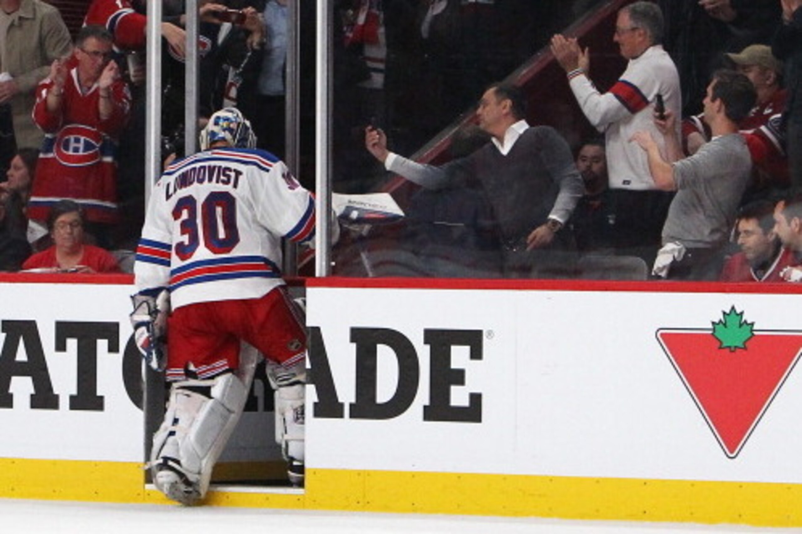 MONTREAL, QC - MAY 27: Henrik Lundqvist #30 of the New York Rangers walks off the ice after being pulled in the second period against the Montreal Canadiens during Game Five of the Eastern Conference Final in the 2014 NHL Stanley Cup Playoffs at Bell Cent