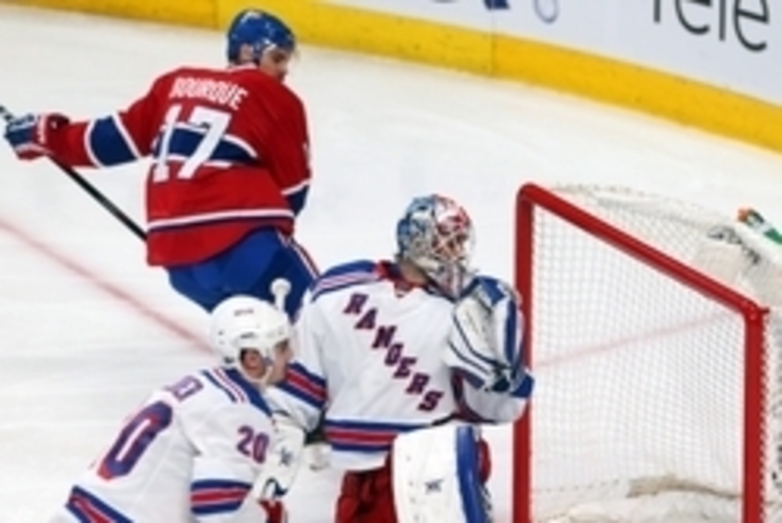 May 27, 2014; Montreal, Quebec, CAN; Montreal Canadiens left wing Rene Bourque (17) scores a goal against New York Rangers goalie Cam Talbot (33) as left wing Chris Kreider (20) passes on during the third period in the game five of the Eastern Conference