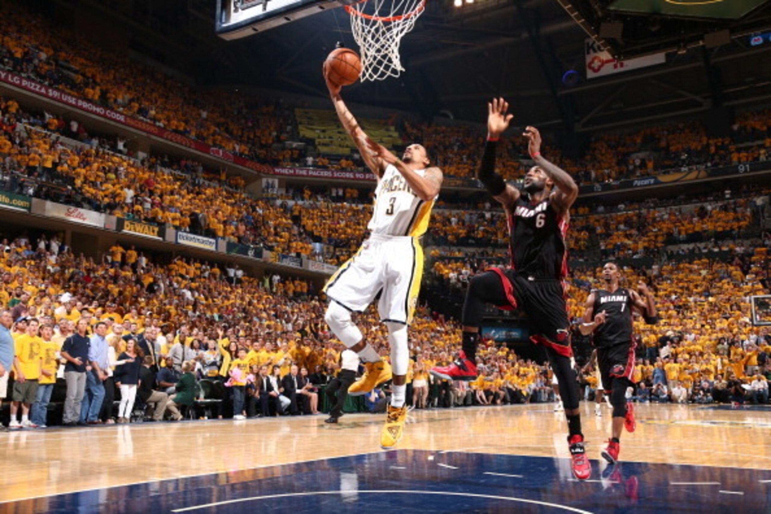 INDIANAPOLIS, IN - MAY 28: LeBron James #6 of the Miami Heat goes up for the block against George Hill #3 of the Indiana Pacers in Game Five of the Eastern Conference Finals during the 2014 NBA Playoffs on May 28, 2014 at Bankers Life Fieldhouse, Indianap