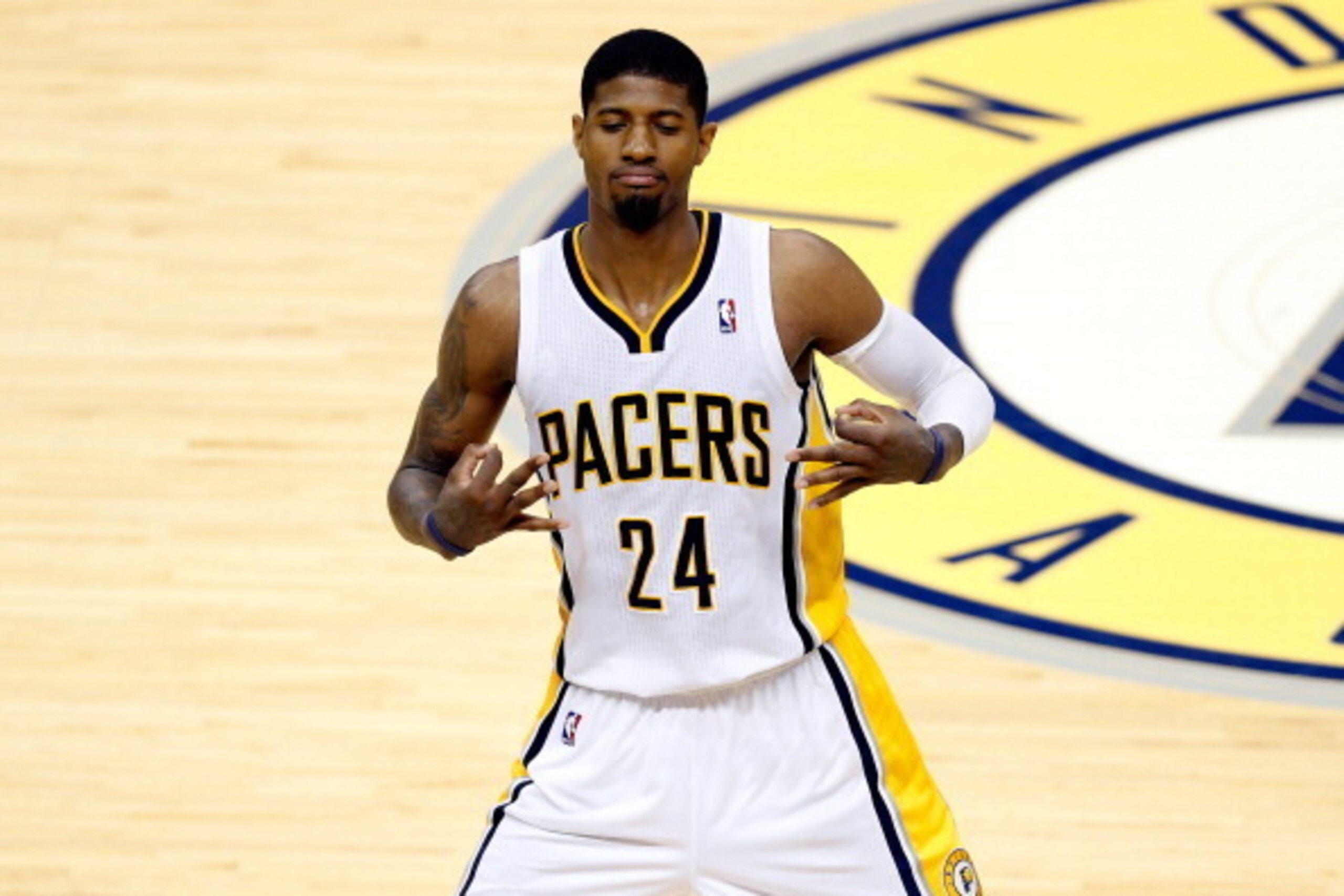 INDIANAPOLIS, IN - MAY 28:  Paul George #24 of the Indiana Pacers celebrates after hitting a shot against the Miami Heat during Game Five of the Eastern Conference Finals of the 2014 NBA Playoffs at Bankers Life Fieldhouse on May 28, 2014 in Indianapolis,