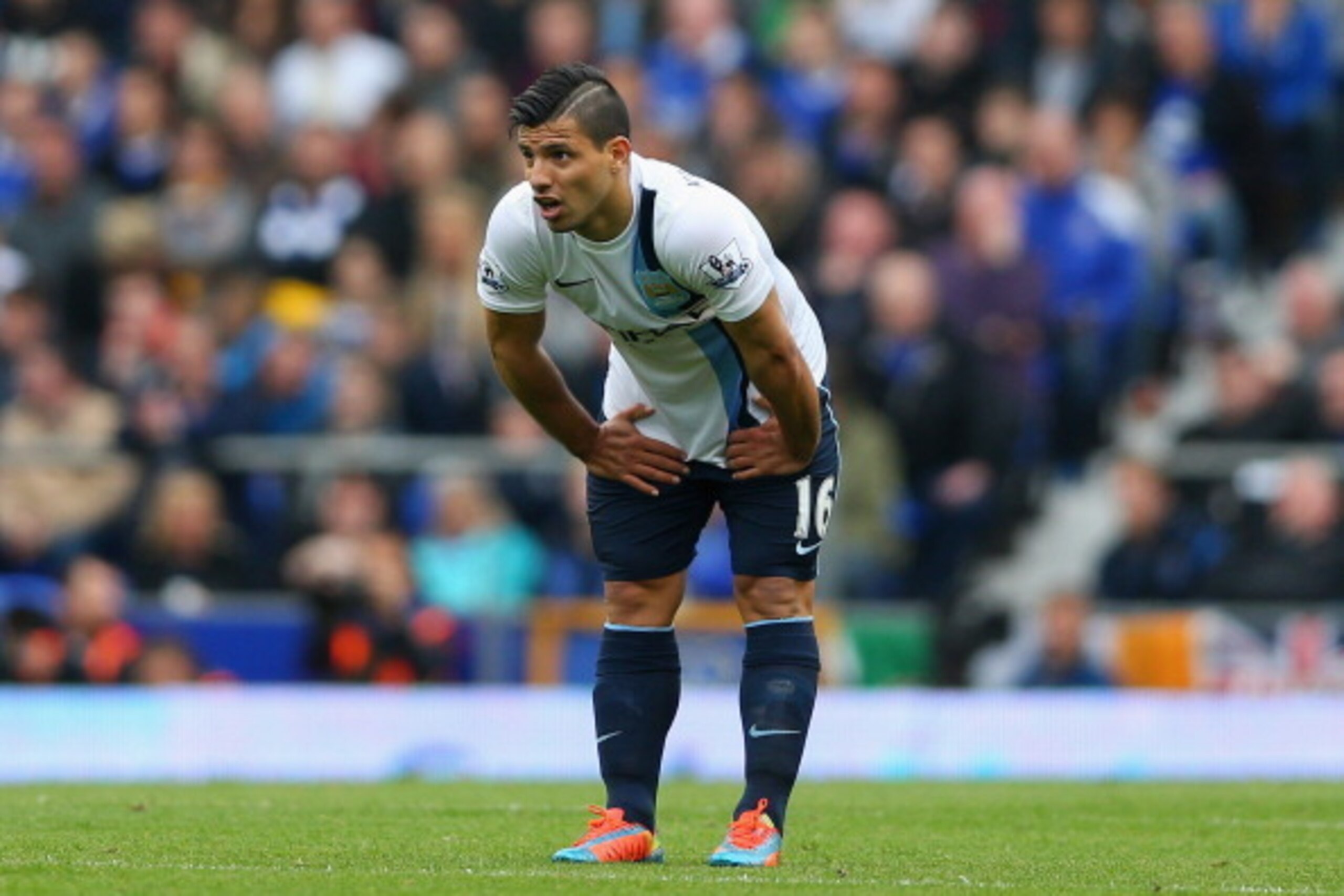 LIVERPOOL, ENGLAND - MAY 03:  Sergio Aguero of Manchester City reacts after sustaining an injury during the Barclays Premier League match between Everton and Manchester City at Goodison Park on May 3, 2014 in Liverpool, England.  (Photo by Clive Brunskill