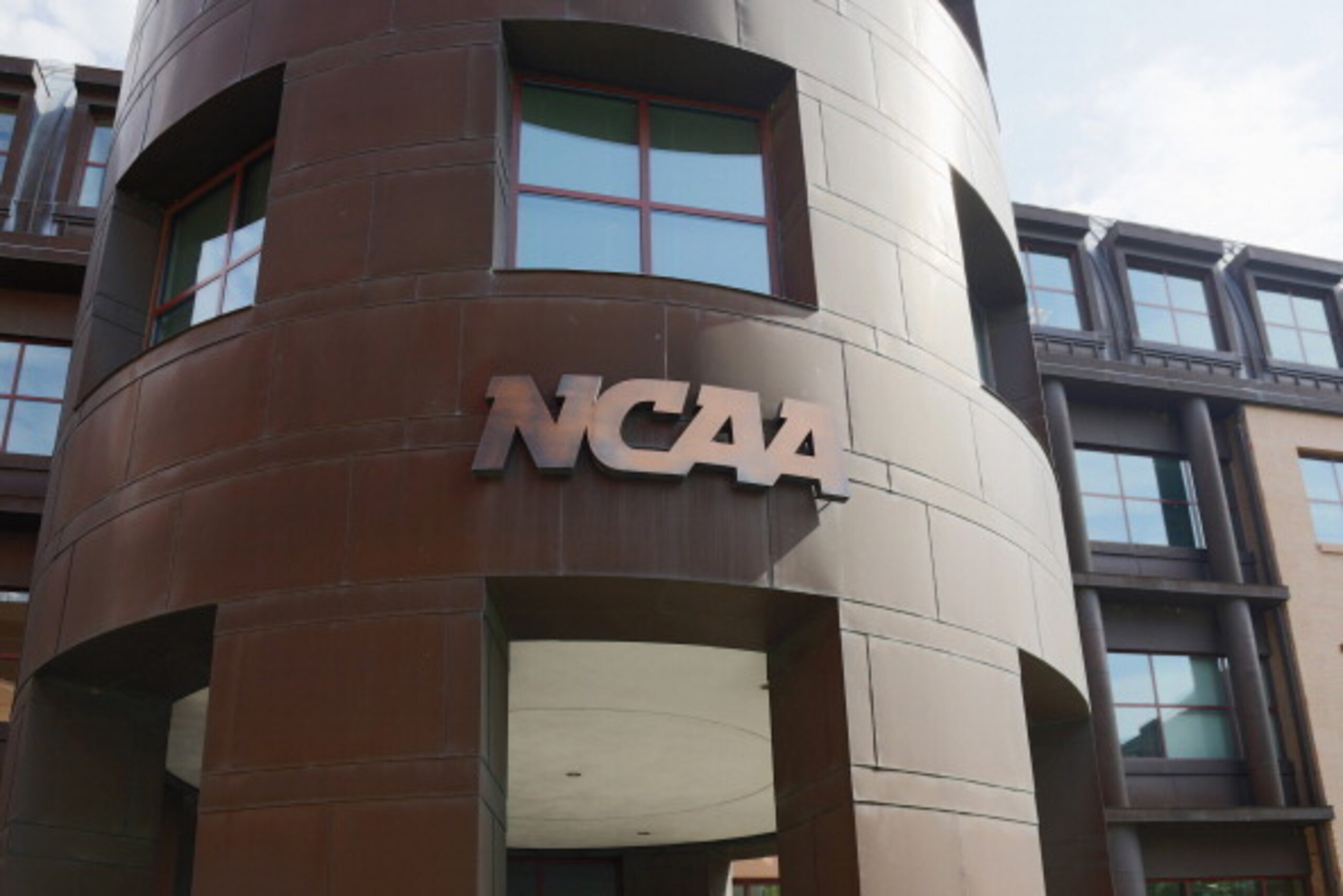 INDIANAPOLIS, IN - JULY 23: The entrance to the NCAA's headquarters is seen following an announcement of sanctions against Penn State University's football program on July 23, 2012 in Indianapolis, Indiana. The sanctions are a result of a report that the 