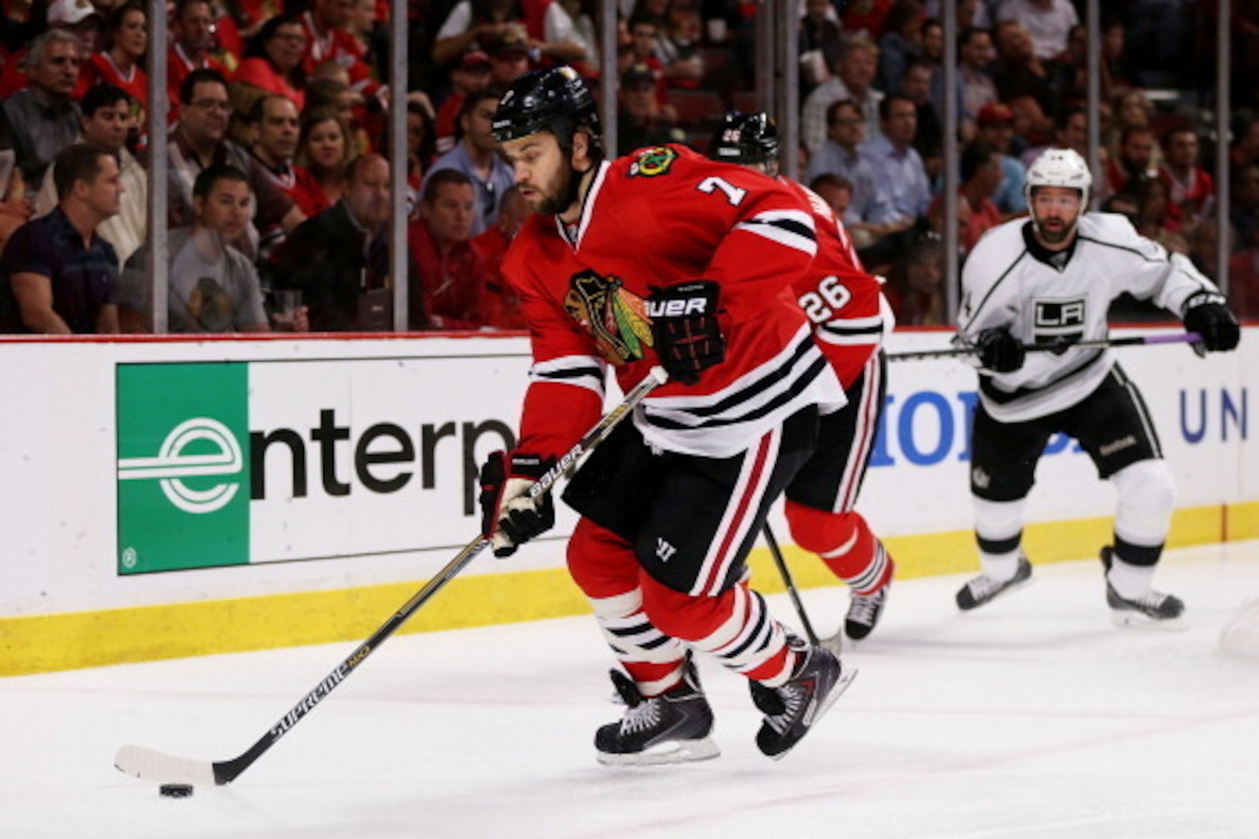 CHICAGO, IL - MAY 21:  Brent Seabrook #7 of the Chicago Blackhawks controls the puck against the Los Angeles Kings in Game Two of the Western Conference Final during the 2014 Stanley Cup Playoffs at United Center on May 21, 2014 in Chicago, Illinois.  (Ph