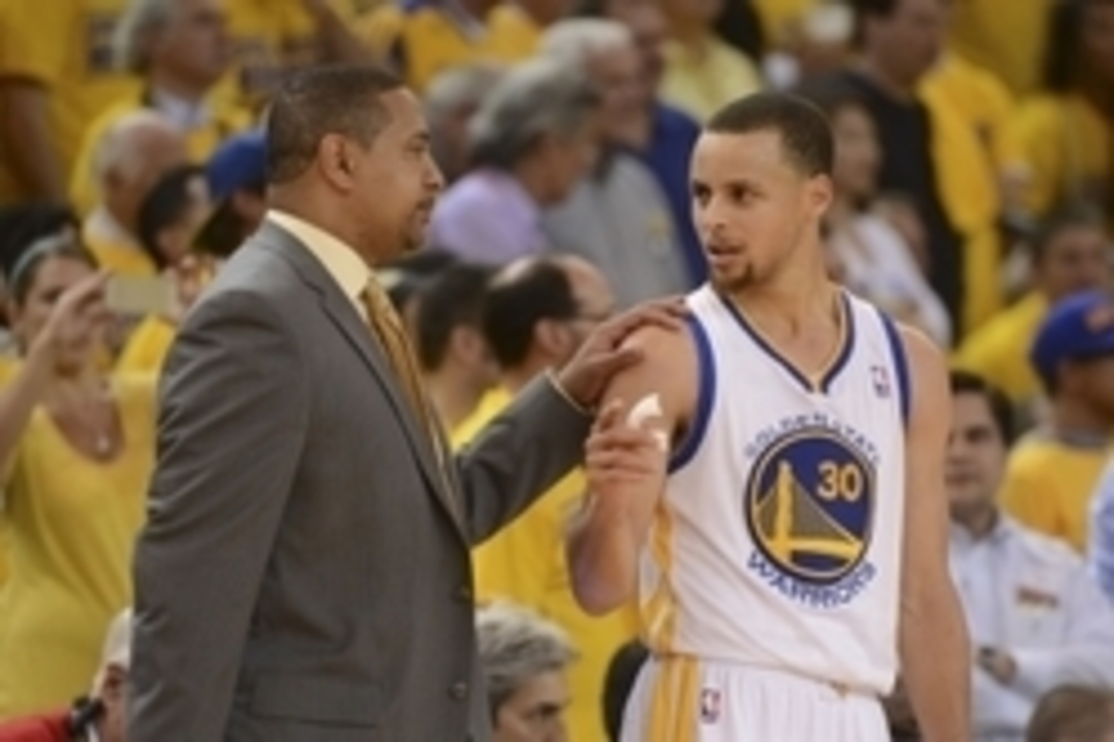 May 1, 2014; Oakland, CA, USA; Golden State Warriors head coach Mark Jackson (left) talks to guard Stephen Curry (30) against the Los Angeles Clippers during the fourth quarter in game six of the first round of the 2014 NBA Playoffs at Oracle Arena. The W May 1, 2014; Oakland, CA, USA; Golden State Warriors head coach Mark Jackson (left) talks to guard Stephen Curry (30) against the Los Angeles Clippers during the fourth quarter in game six of the first round of the 2014 NBA Playoffs at Oracle Arena. The W
