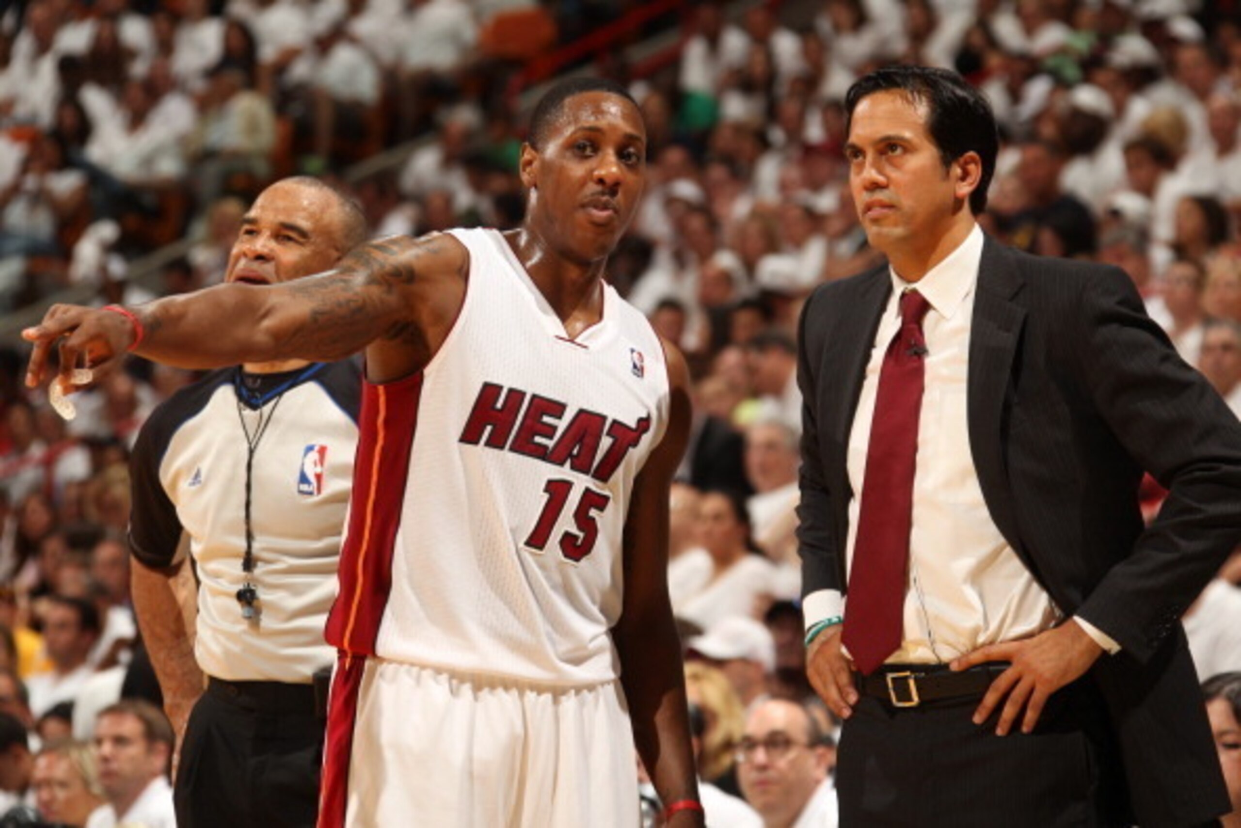 MIAMI, FL - May 26: Mario Chalmers #15 of the Miami Heat talks with Erik Spoelstra of the Miami Heat against the Indiana Pacers in Game Four of the Eastern Conference Finals during the 2014 NBA Playoffs at the American Airlines Arena in Miami, Florida on 