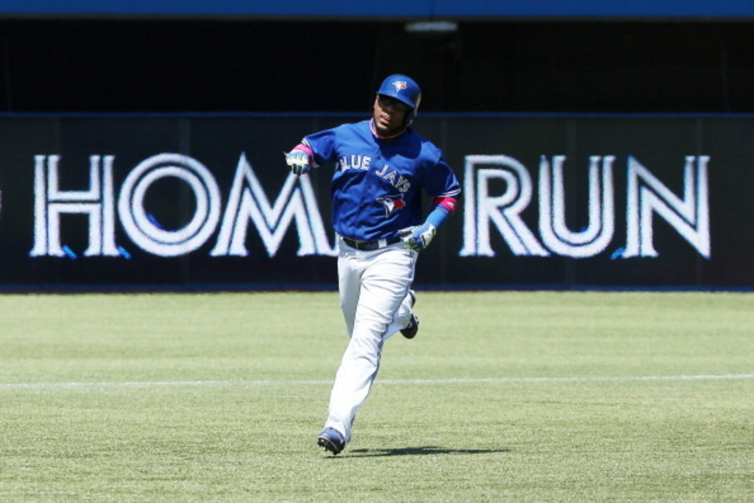 TORONTO, CANADA - MAY 25: Edwin Encarnacion #10 of the Toronto Blue Jays circles the bases as he hits a solo home run in the fourth inning during MLB game action against the Oakland Athletics on May 25, 2014 at Rogers Centre in Toronto, Ontario, Canada. ( TORONTO, CANADA - MAY 25: Edwin Encarnacion #10 of the Toronto Blue Jays circles the bases as he hits a solo home run in the fourth inning during MLB game action against the Oakland Athletics on May 25, 2014 at Rogers Centre in Toronto, Ontario, Canada. (
