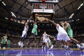 SACRAMENTO, CA - DECEMBER 30: Rajon Rondo #9 of the Boston Celtics shoots against James Johnson #52 of the Sacramento Kings on December 30, 2012 at Sleep Train Arena in Sacramento, California. NOTE TO USER: User expressly acknowledges and agrees that, by 