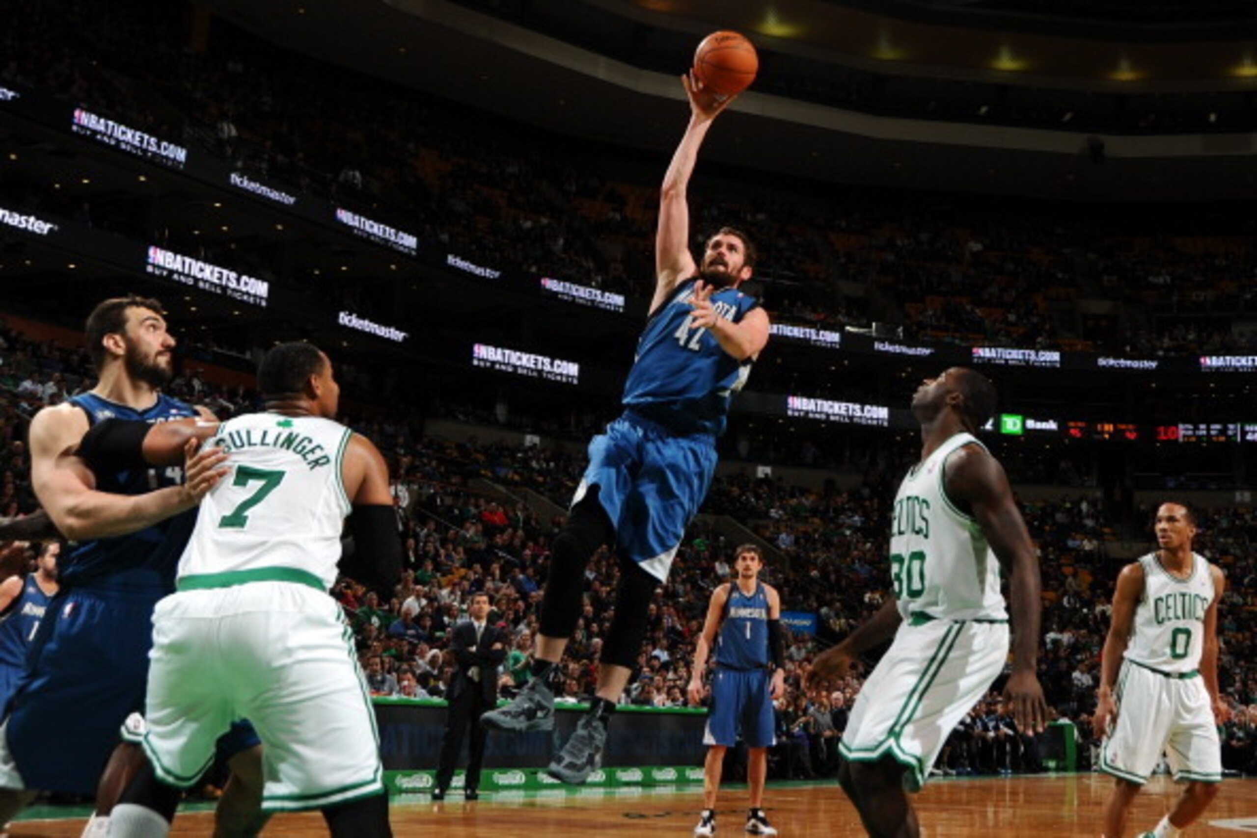 BOSTON, MA - DECEMBER 16: Kevin Love #42 of the Minnesota Timberwolves shoots the ball against the Boston Celtics on December 16, 2013 at the TD Garden in Boston, Massachusetts.  NOTE TO USER: User expressly acknowledges and agrees that, by downloading an