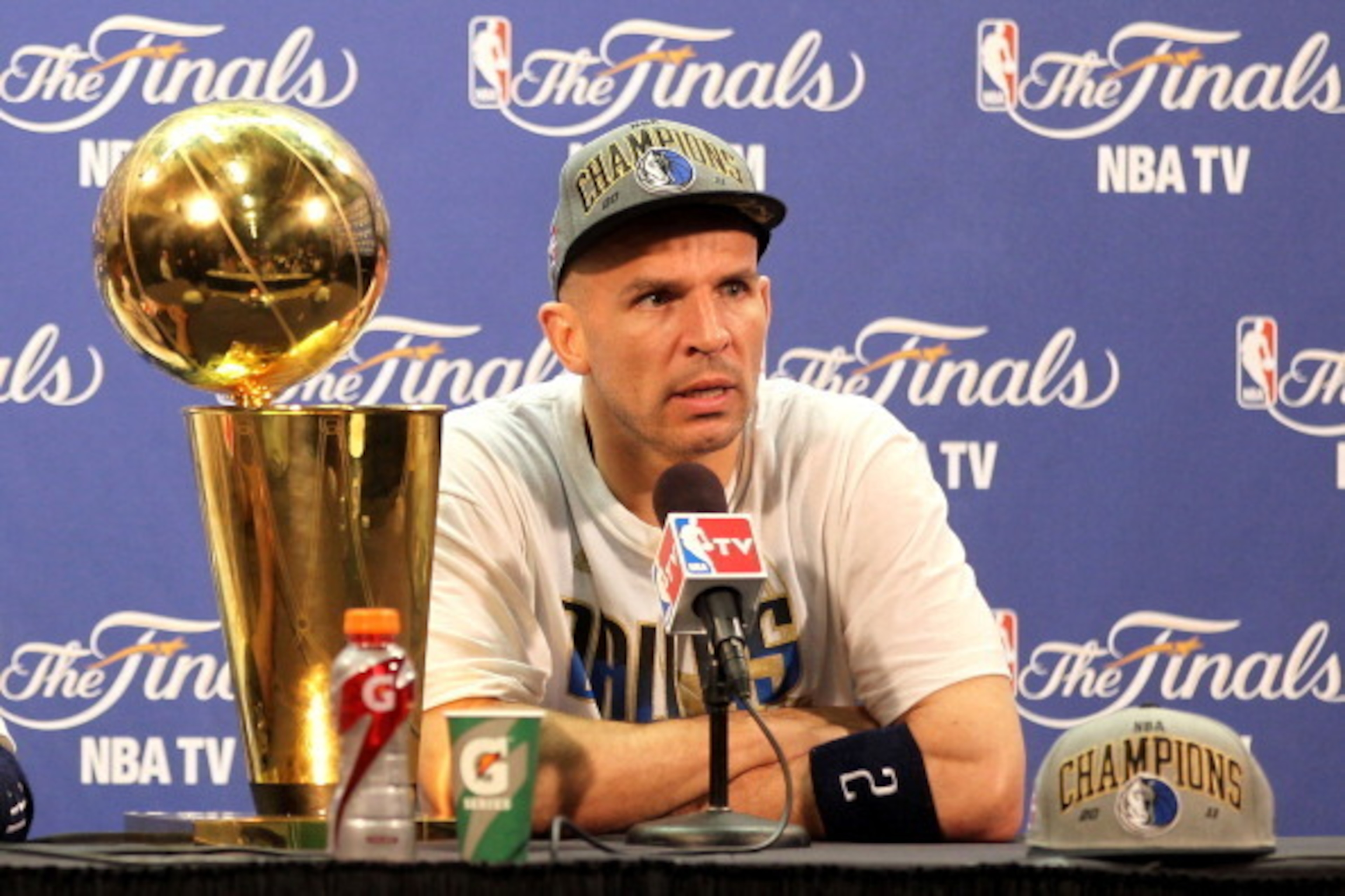 MIAMI, FL - JUNE 12: Jason Kidd #2 of the Dallas Mavericks answers questions from the media as the Larry O'Brien Championship trophy sits on the table during a post game news conference after the Mavericks won 105-95 against the Miami Heat in Game Six of MIAMI, FL - JUNE 12: Jason Kidd #2 of the Dallas Mavericks answers questions from the media as the Larry O'Brien Championship trophy sits on the table during a post game news conference after the Mavericks won 105-95 against the Miami Heat in Game Six of