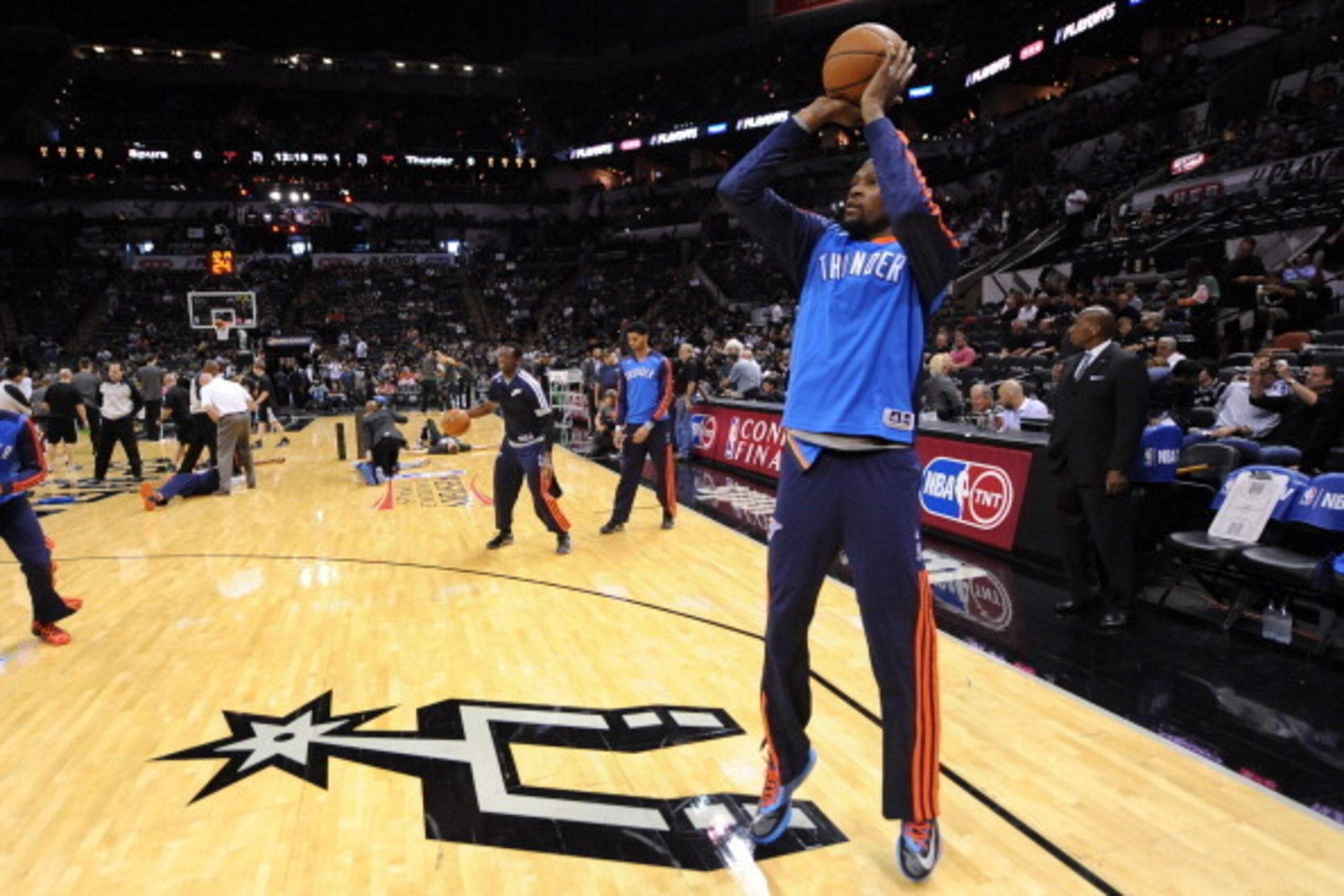 SAN ANTONIO, TX - MAY 29: Kevin Durant #35 of the Oklahoma City Thunder warms up before the game against the San Antonio Spurs in Game Five of the Western Conference Finals during the 2014 NBA Playoffs on May 29, 2014 at the AT&T Center in San Antonio, T SAN ANTONIO, TX - MAY 29: Kevin Durant #35 of the Oklahoma City Thunder warms up before the game against the San Antonio Spurs in Game Five of the Western Conference Finals during the 2014 NBA Playoffs on May 29, 2014 at the AT&T Center in San Antonio, T