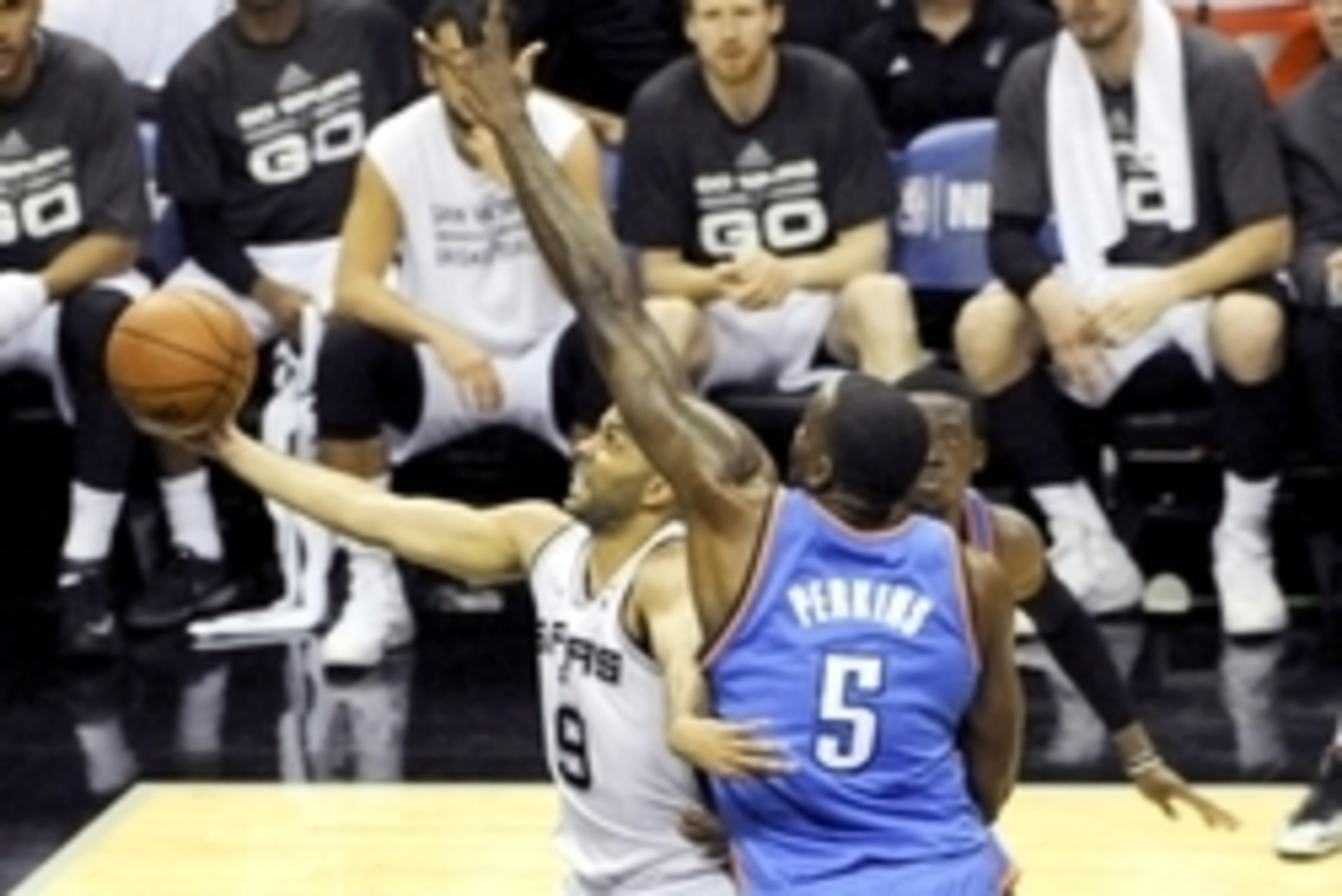 May 29, 2014; San Antonio, TX, USA; San Antonio Spurs guard Tony Parker (9) shoots past Oklahoma City Thunder center Kendrick Perkins (5) during the first half in game five of the Western Conference Finals of the 2014 NBA Playoffs at AT&T Center. Mandator May 29, 2014; San Antonio, TX, USA; San Antonio Spurs guard Tony Parker (9) shoots past Oklahoma City Thunder center Kendrick Perkins (5) during the first half in game five of the Western Conference Finals of the 2014 NBA Playoffs at AT&T Center. Mandator