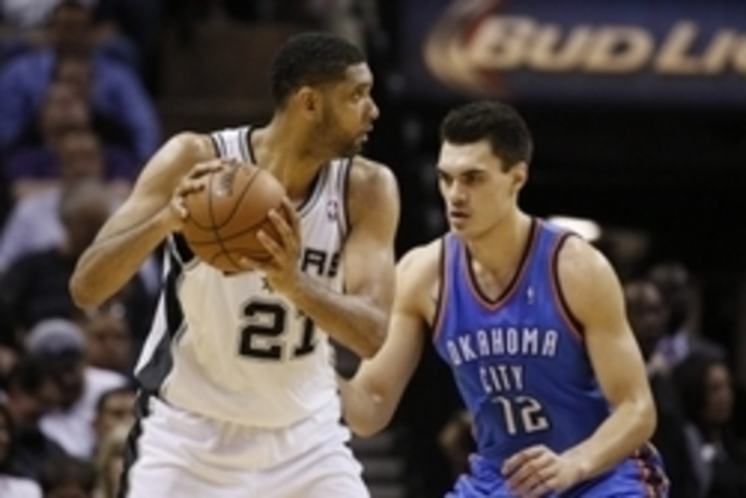 May 29, 2014; San Antonio, TX, USA; San Antonio Spurs forward Tim Duncan (21) looks to drive as Oklahoma City Thunder center Steven Adams (12) defends during the first half in game five of the Western Conference Finals of the 2014 NBA Playoffs at AT&T Cen May 29, 2014; San Antonio, TX, USA; San Antonio Spurs forward Tim Duncan (21) looks to drive as Oklahoma City Thunder center Steven Adams (12) defends during the first half in game five of the Western Conference Finals of the 2014 NBA Playoffs at AT&T Cen