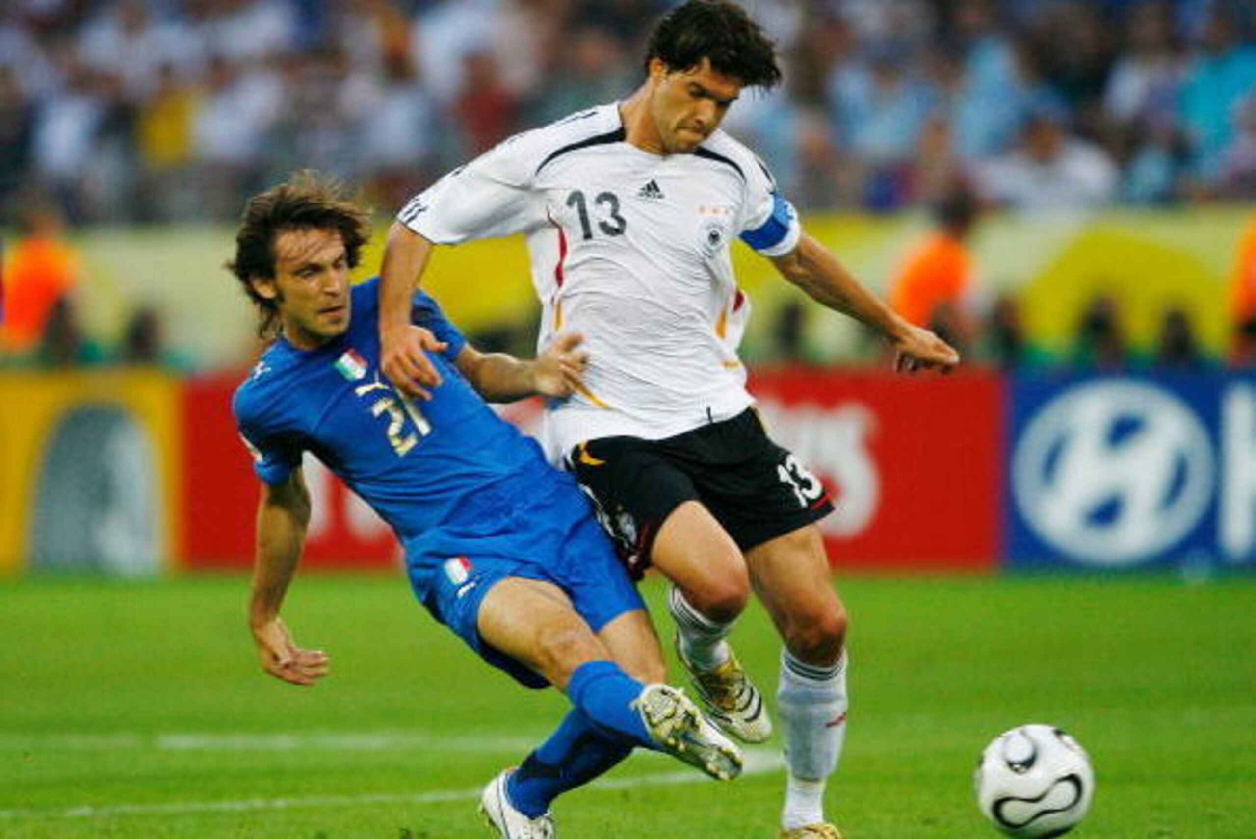DORTMUND, GERMANY - JULY 04: Michael Ballack of Germany is challenged by Andrea Pirlo of Italy during the FIFA World Cup Germany 2006 Semi-final match between Germany and Italy played at the Stadium Dortmund on July 04, 2006 in Dortmund, Germany.  (Photo 