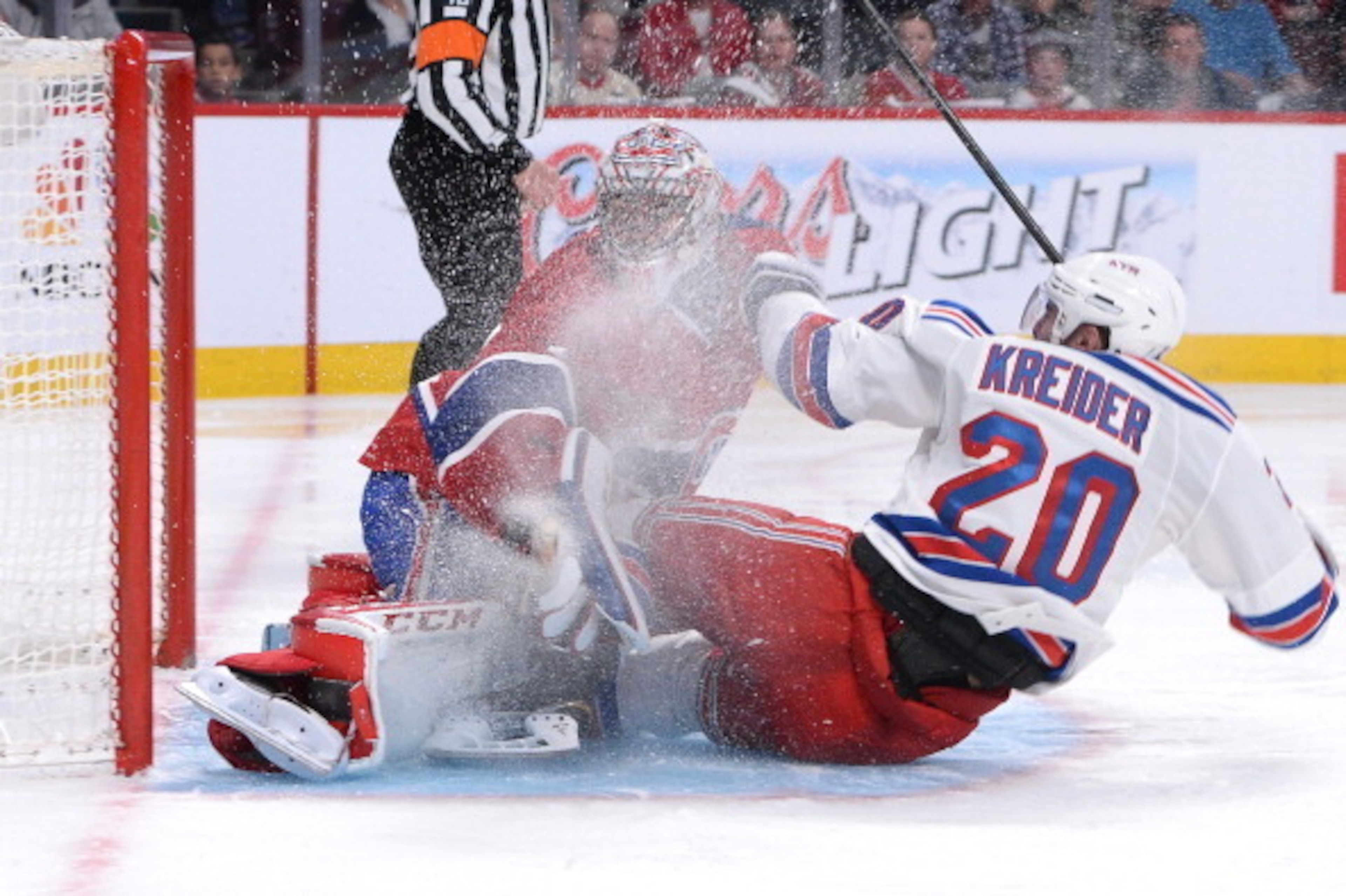 MONTREAL, QC - MAY 17: Chris Kreider #20 of the New York Rangers collides with Carey Price #31 of the Montreal Canadiens  in Game One of the Eastern Conference Final during the 2014 Stanley Cup Playoffs at the Bell Centre on May 17, 2014 in Montreal, Queb