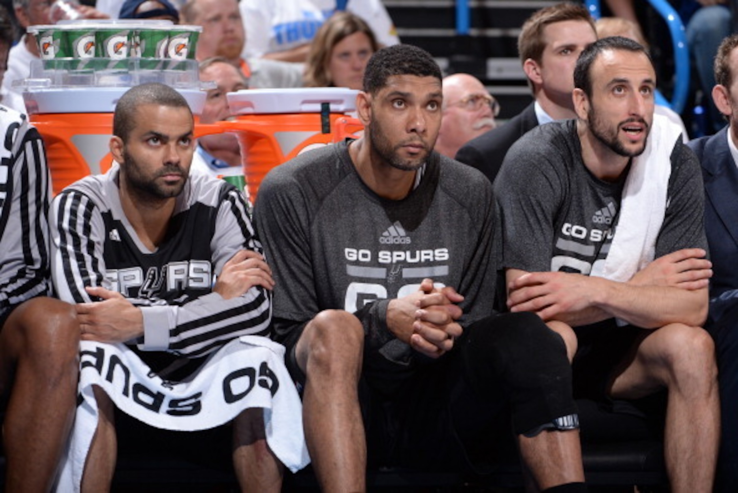 OKLAHOMA CITY, OK - MAY 27: Tony Parker #9, Tim Duncan #21, and Manu Ginobili #20 of the San Antonio Spurs look on in Game Four of the Western Conference Finals against the Oklahoma City Thunder during the 2014 NBA Playoffs on May 27, 2014 at the Chesapea