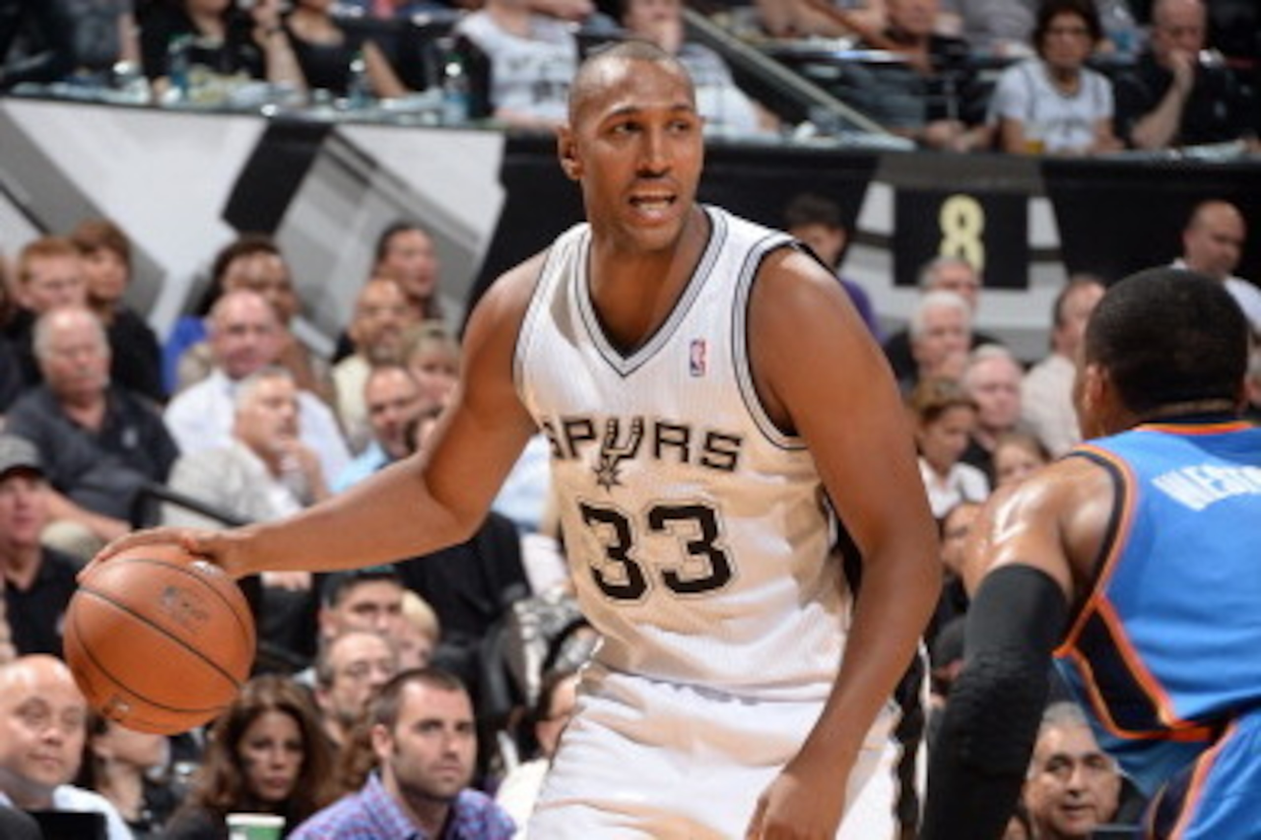 SAN ANTONIO,TX - MAY 29: Boris Diaw #33 of the San Antonio Spurs looks to pass the ball against the Oklahoma City Thunder in Game Five of the Western Conference Finals during the 2014 NBA Playoffs on May 29, 2014 at the AT&T Center in San Antonio, Texas. 