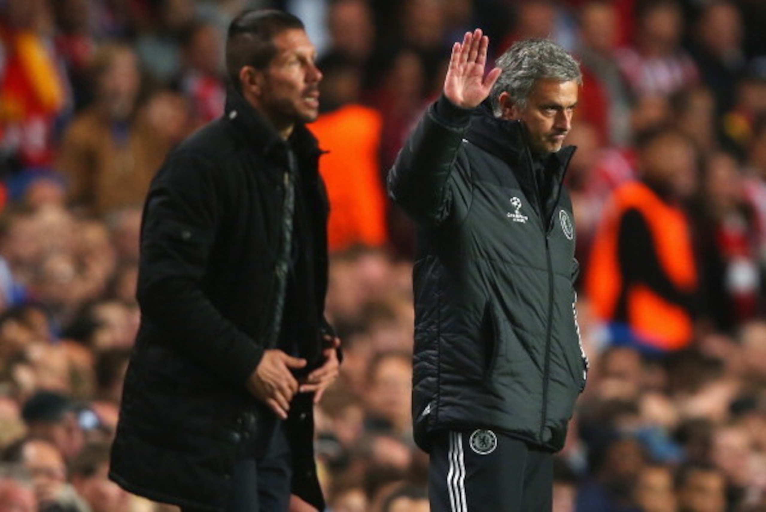 LONDON, ENGLAND - APRIL 30:  Jose Mourinho, manager of Chelsea acknowledges the crowd with Diego Simeone, coach of Club Atletico de Madrid during the UEFA Champions League semi-final second leg match between Chelsea and Club Atletico de Madrid at Stamford