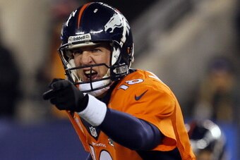 EAST RUTHERFORD, NJ - FEBRUARY 02:  Quarterback Peyton Manning #18 of the Denver Broncos calls a play against the Seattle Seahawks during Super Bowl XLVIII at MetLife Stadium on February 2, 2014 in East Rutherford, New Jersey.  (Photo by Kevin C. Cox/Gett