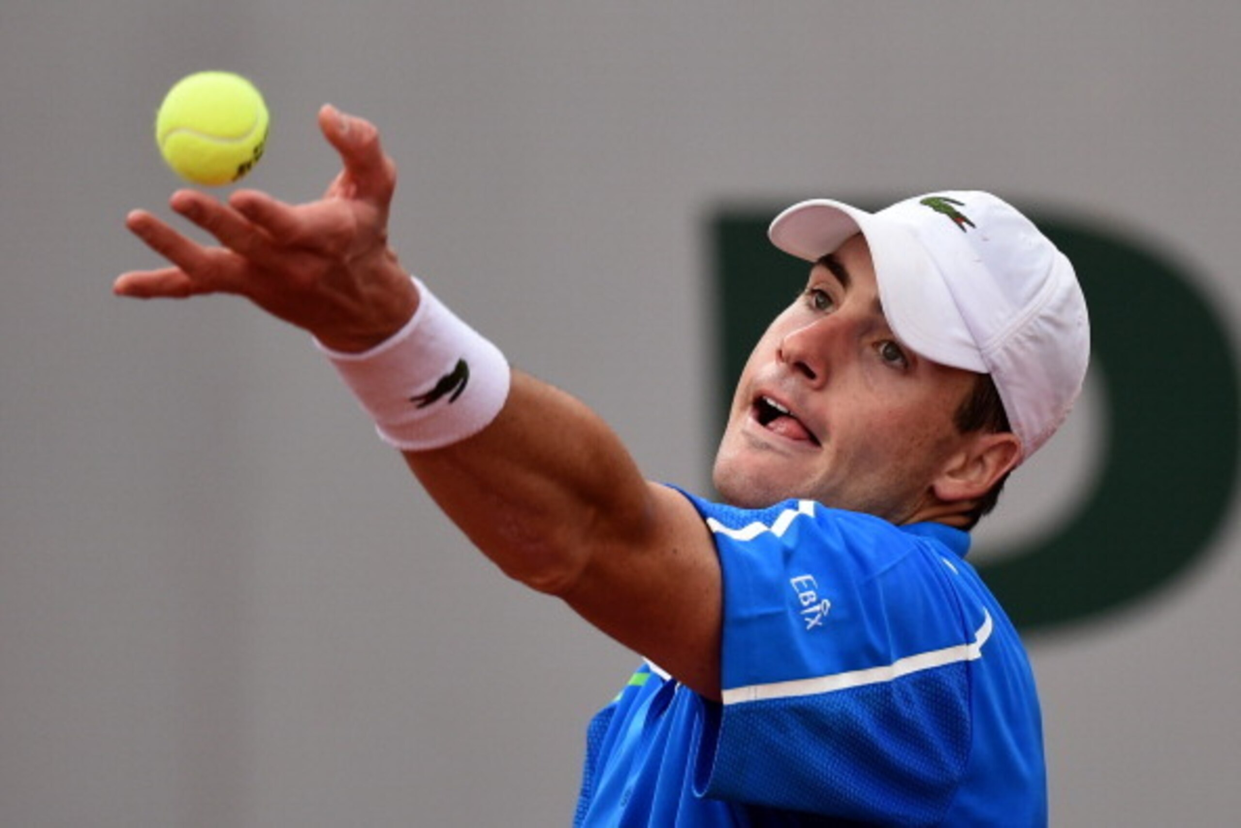 PARIS, FRANCE - MAY 30:  John Isner of the United States serves during his men's singles match against Tommy Robredo of Spain on day six of the French Open at Roland Garros on May 30, 2014 in Paris, France.  (Photo by Matthias Hangst/Getty Images)