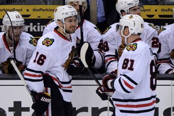 LOS ANGELES, CA - MAY 26:  Marcus Kruger #16 talks with Marian Hossa #81 of the Chicago Blackhawks in the first period while taking on the Los Angeles Kings in Game Four of the Western Conference Final during the 2014 Stanley Cup Playoffs at Staples Cente