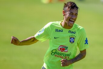 TERESOPOLIS, BRAZIL - MAY 30: Neymar smiles during a training session of the Brazilian national football team at the squad's Granja Comary training complex, in Teresopolis, 90 km from downtown Rio de Janeiro on May 30, 2014 in Teresopolis, Brazil. (Photo 