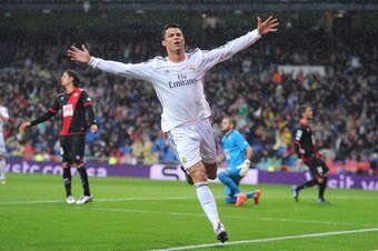 MADRID, SPAIN - MARCH 29:  Cristiano Ronaldo of Real Madrid FC celebrates after scoring his team's opening goal during the La Liga match between Real Madrid CF and Rayo Vallecano de Madrid at Santiago Bernabeu stadium on March 29, 2014 in Madrid, Spain.  