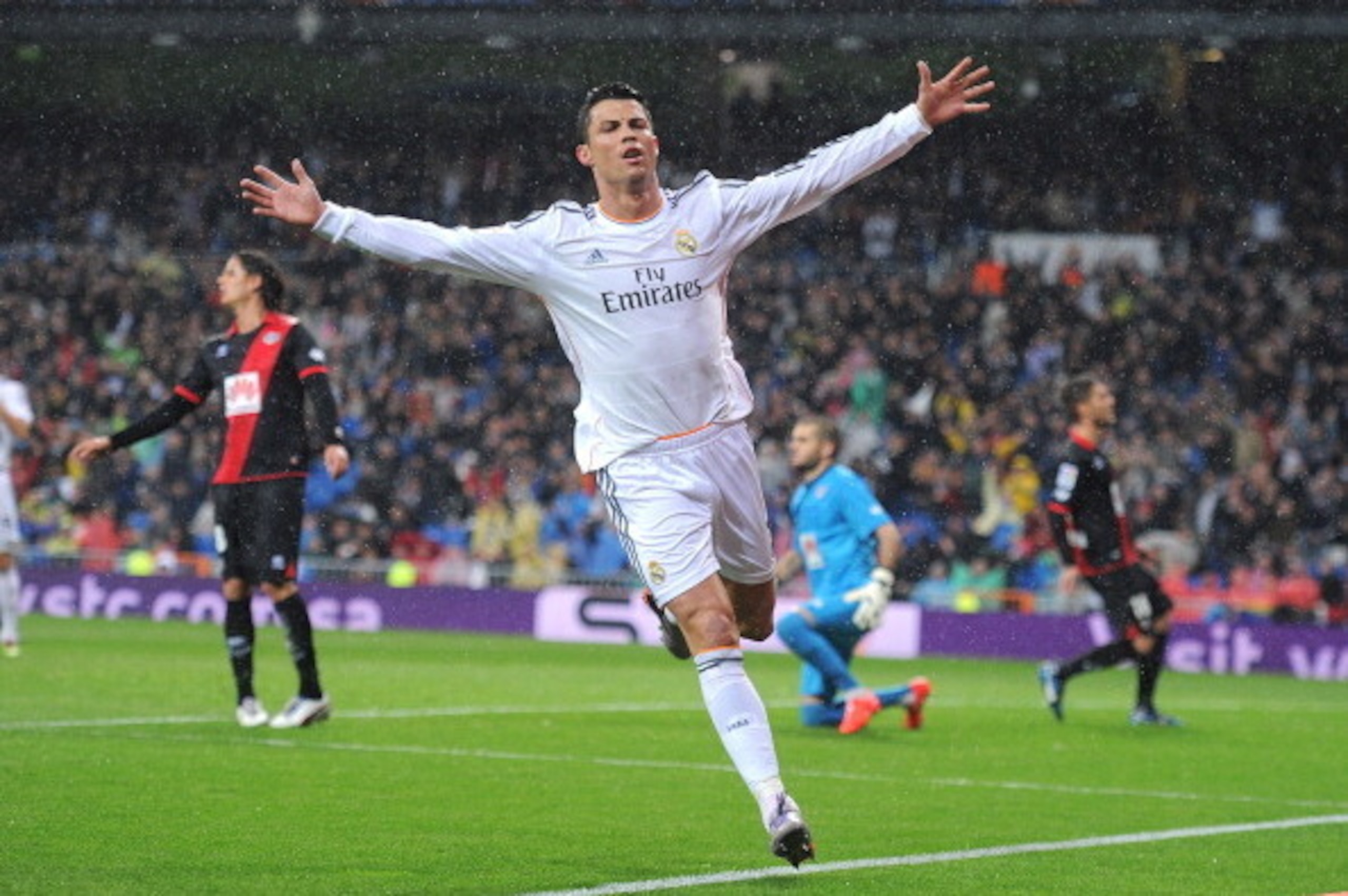 MADRID, SPAIN - MARCH 29:  Cristiano Ronaldo of Real Madrid FC celebrates after scoring his team's opening goal during the La Liga match between Real Madrid CF and Rayo Vallecano de Madrid at Santiago Bernabeu stadium on March 29, 2014 in Madrid, Spain.  