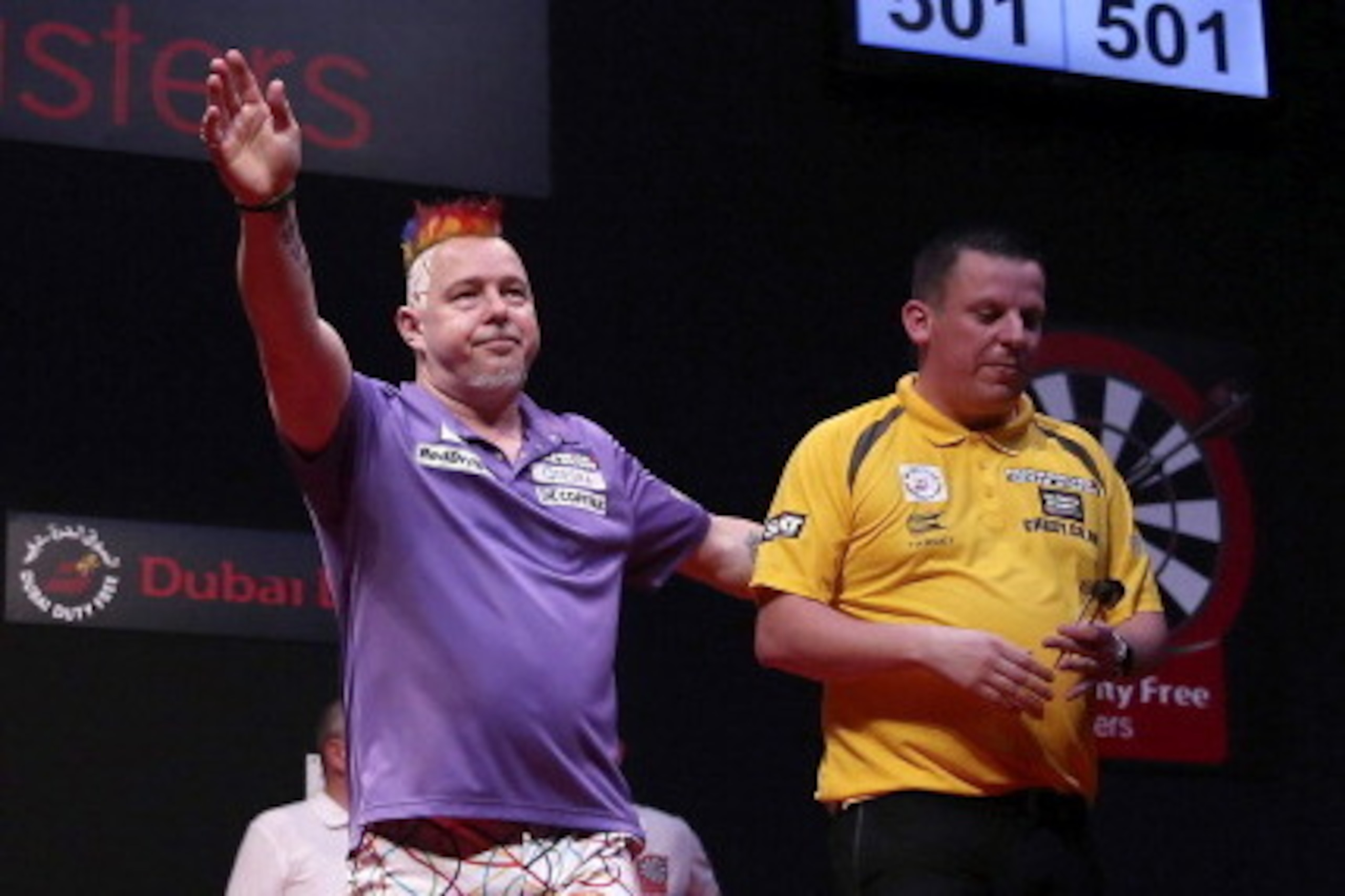 DUBAI, UNITED ARAB EMIRATES - MAY 30: Peter Wright of England celebrates after defeating Dave Chisnall of England during the 2014 Dubai Duty Free Darts Masters Semi-Final match at Dubai Duty Free Tennis Stadium, Irish Village on May 30, 2014 in Dubai, Un DUBAI, UNITED ARAB EMIRATES - MAY 30: Peter Wright of England celebrates after defeating Dave Chisnall of England during the 2014 Dubai Duty Free Darts Masters Semi-Final match at Dubai Duty Free Tennis Stadium, Irish Village on May 30, 2014 in Dubai, Un