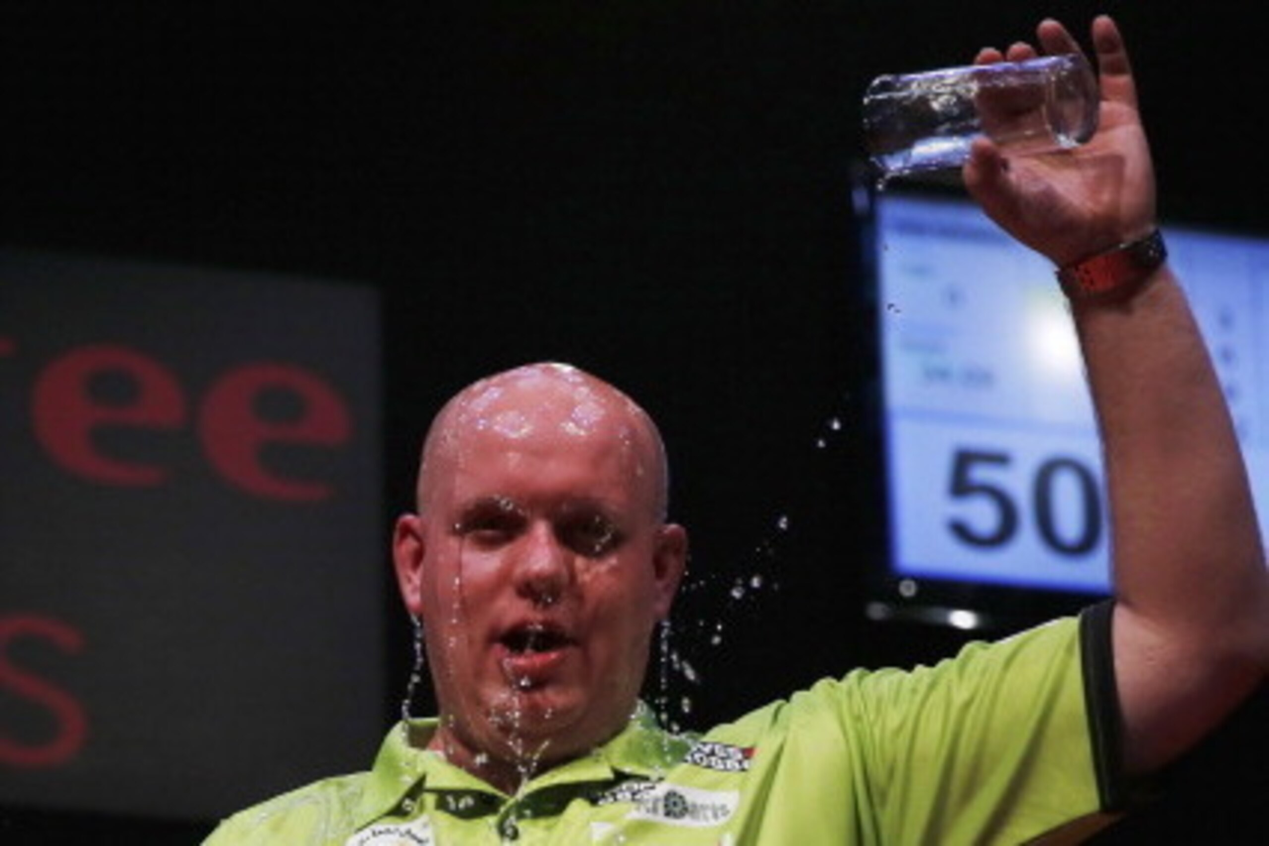DUBAI, UNITED ARAB EMIRATES - MAY 29: Michael Van Gerwen of the Netherlands celebrates after defeating James Wade of England during the 2014 Dubai Duty Free Darts Masters Quarter-Final match at Dubai Duty Free Tennis Stadium, Irish Village on May 29, 201 DUBAI, UNITED ARAB EMIRATES - MAY 29: Michael Van Gerwen of the Netherlands celebrates after defeating James Wade of England during the 2014 Dubai Duty Free Darts Masters Quarter-Final match at Dubai Duty Free Tennis Stadium, Irish Village on May 29, 201
