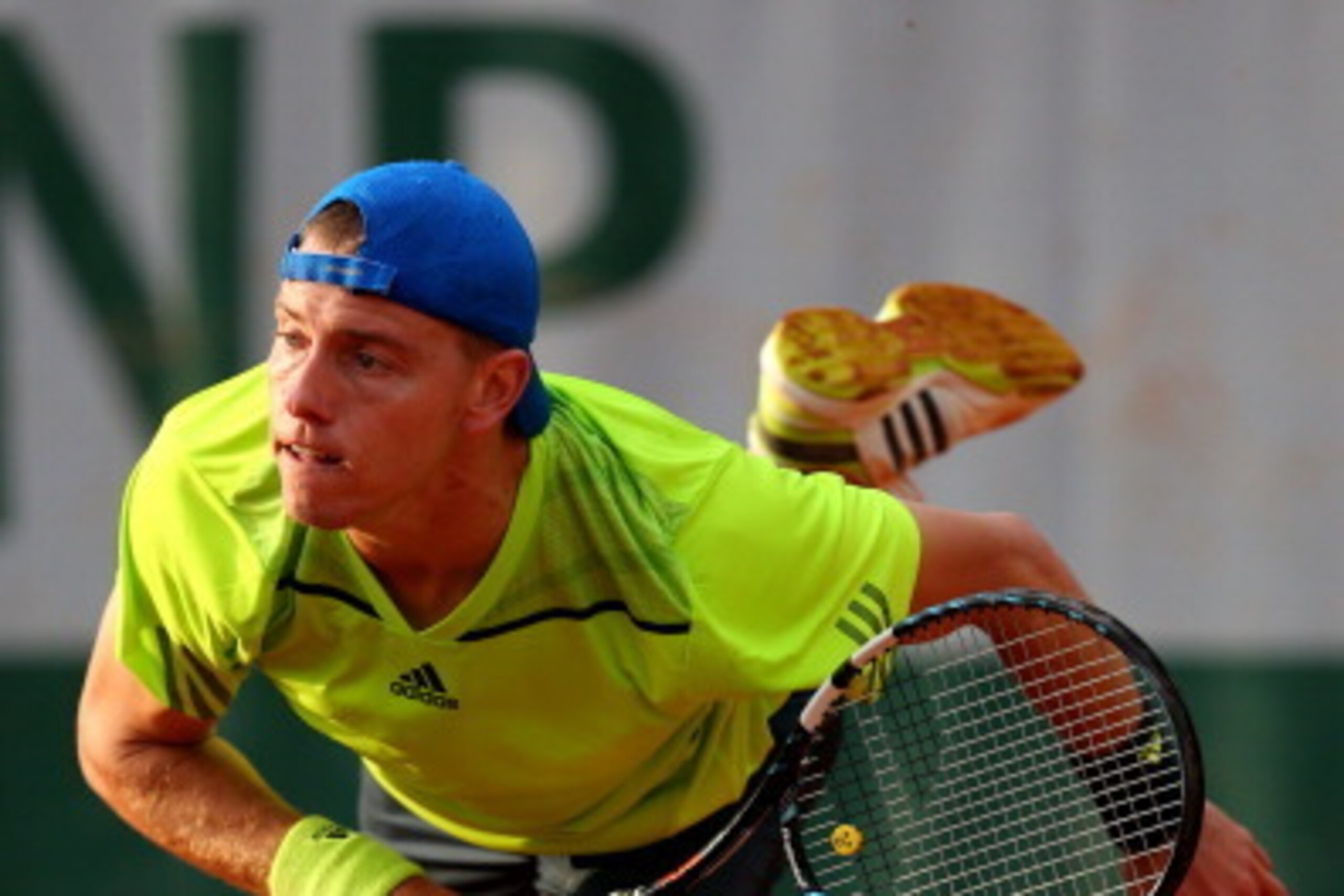 PARIS, FRANCE - MAY 26:  James Duckworth of Australia serves during his men's singles match against Leonardo Mayer of Argentina on day two of the French Open at Roland Garros on May 26, 2014 in Paris, France.  (Photo by Clive Brunskill/Getty Images)