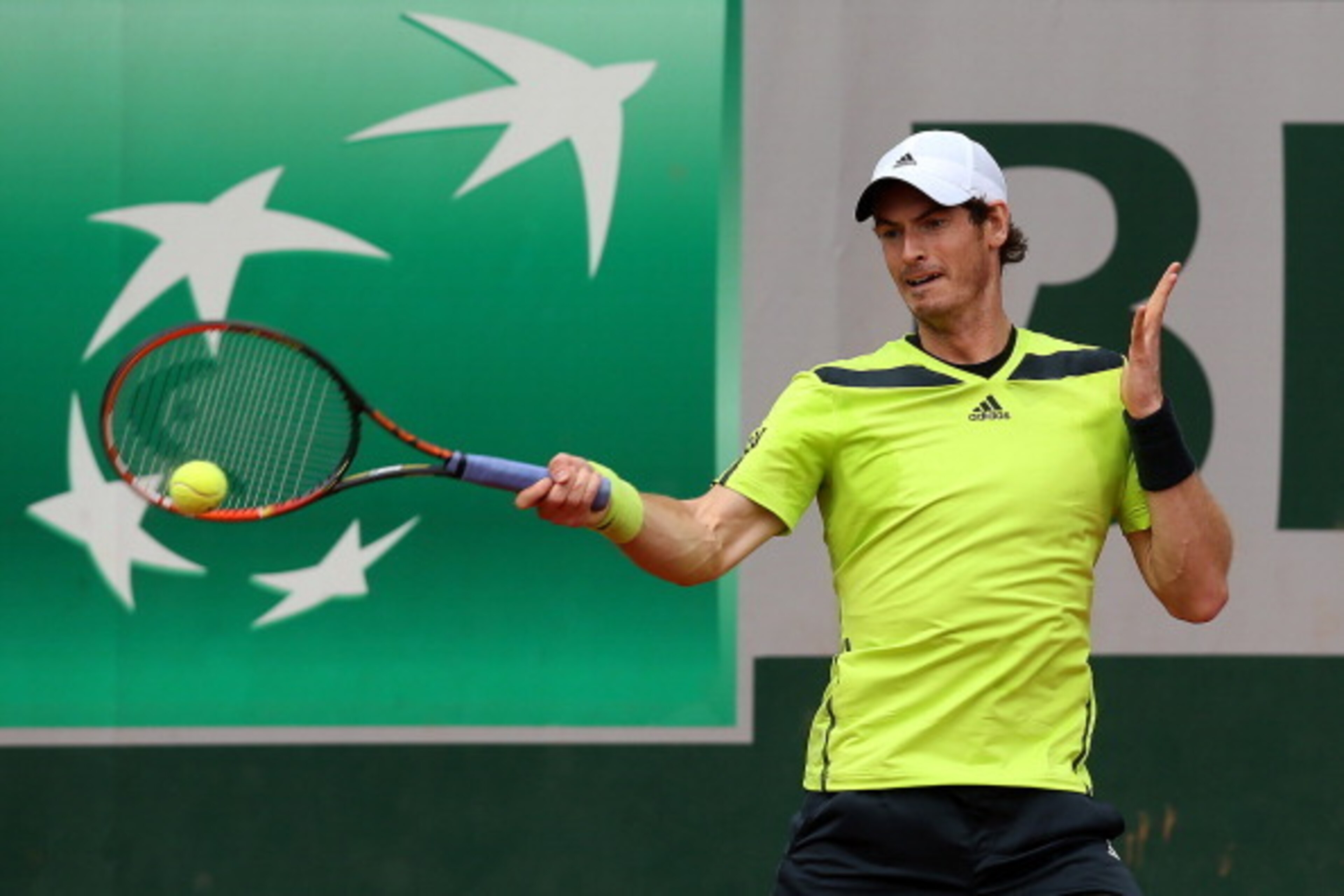 PARIS, FRANCE - MAY 29:  Andy Murray of Great Britain returns a shot during his men's singles match against Marinko Matosevic of Australia on day five of the French Open at Roland Garros on May 29, 2014 in Paris, France.  (Photo by Matthew Stockman/Getty 