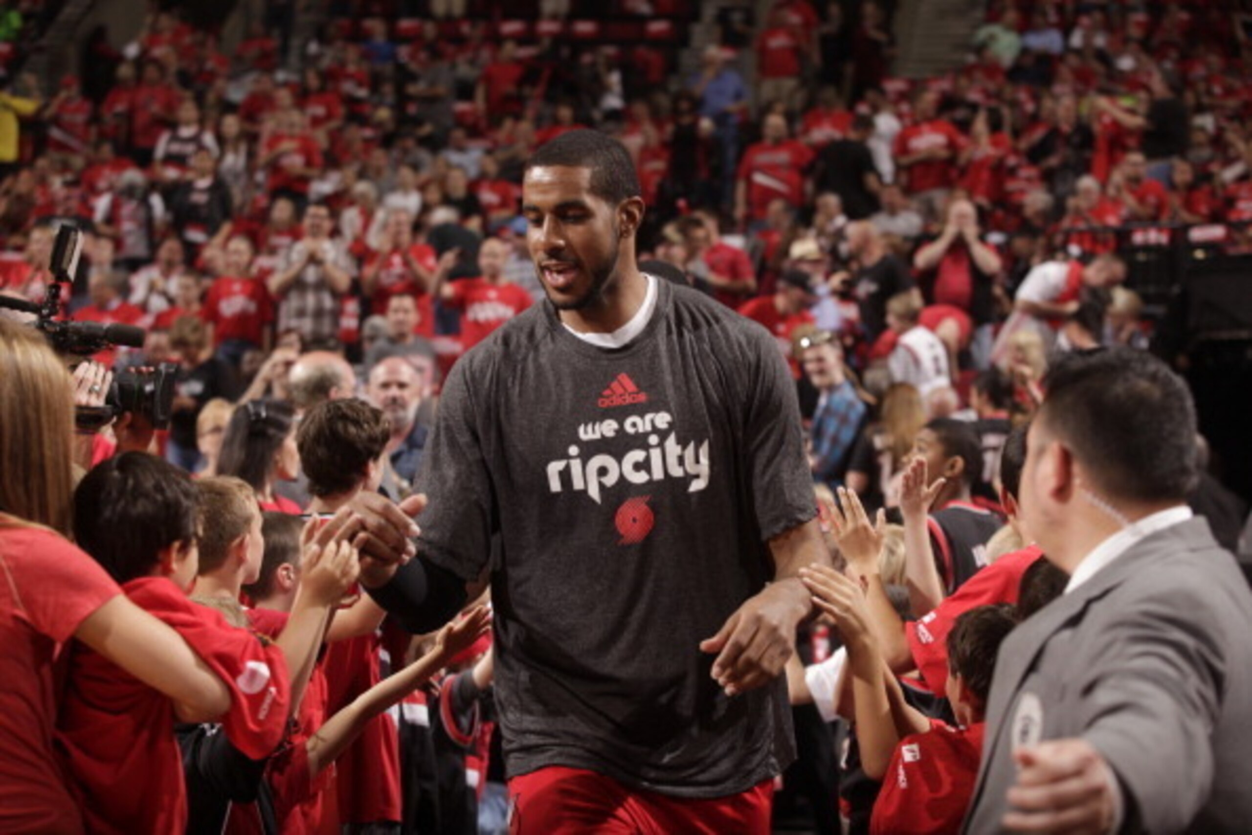 PORTLAND, OR - MAY 12: LaMarcus Aldridge #12 of the Portland Trail Blazers enters the court before Game Four of the Western Conference Semifinals against the San Antonio Spurs during the 2014 NBA Playoffs on May 12, 2014 at the Moda Center in Portland, Or