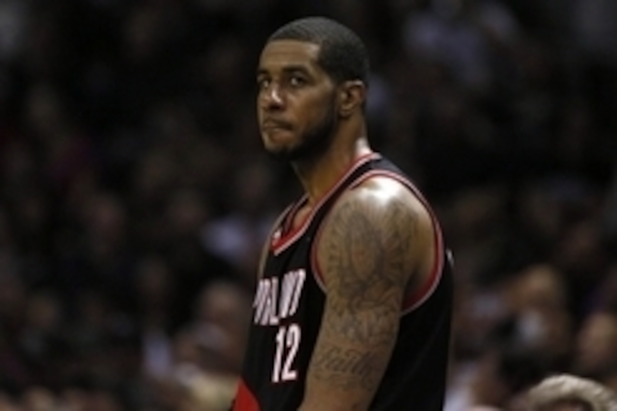 May 6, 2014; San Antonio, TX, USA; Portland Trail Blazers forward LaMarcus Aldridge (12) waits to enter the game against the San Antonio Spurs in game one of the second round of the 2014 NBA Playoffs at AT&T Center. Mandatory Credit: Soobum Im-USA TODAY S