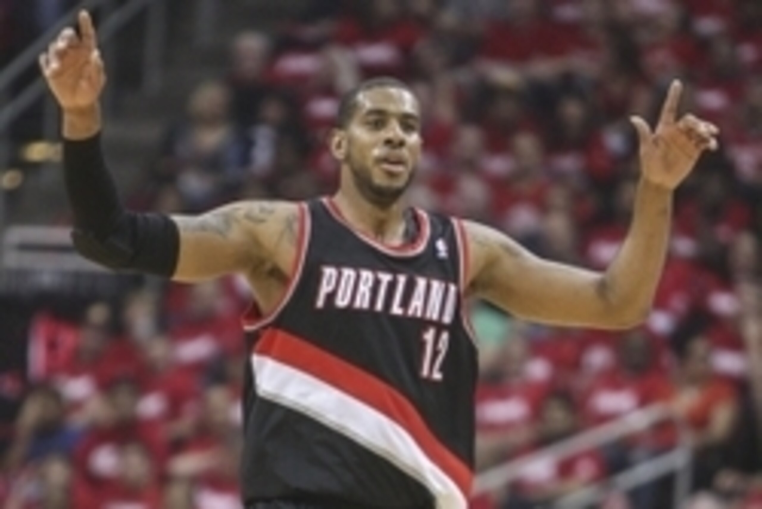 Apr 20, 2014; Houston, TX, USA; Portland Trail Blazers forward LaMarcus Aldridge (12) celebrates after scoring during the first quarter against the Houston Rockets in game one during the first round of the 2014 NBA Playoffs at Toyota Center. Mandatory Cre