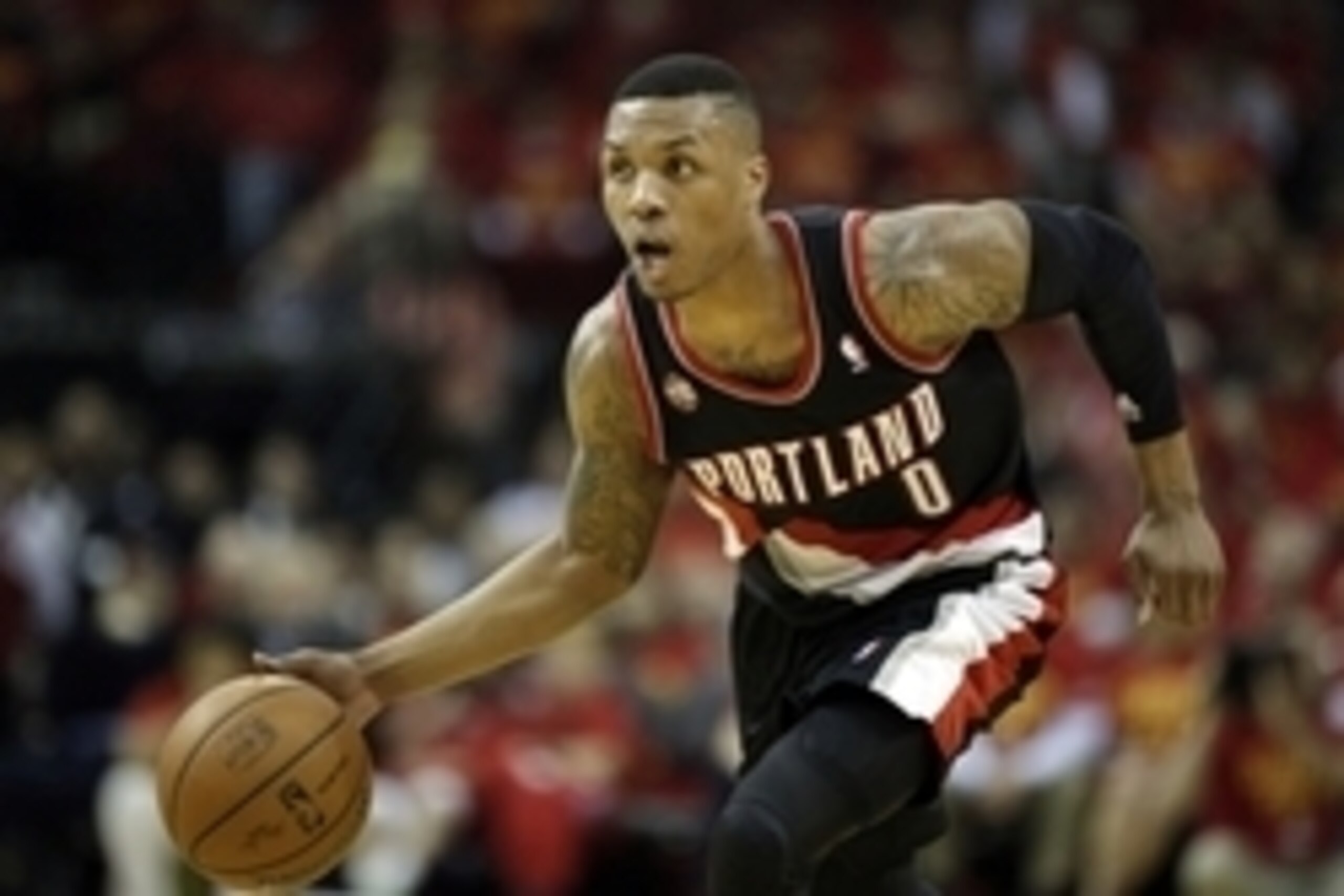 Apr 30, 2014; Houston, TX, USA; Portland Trail Blazers guard Damian Lillard (0) drives to the basket during the third quarter against the Houston Rockets in game five of the first round of the 2014 NBA Playoffs at Toyota Center. Mandatory Credit: Andrew R