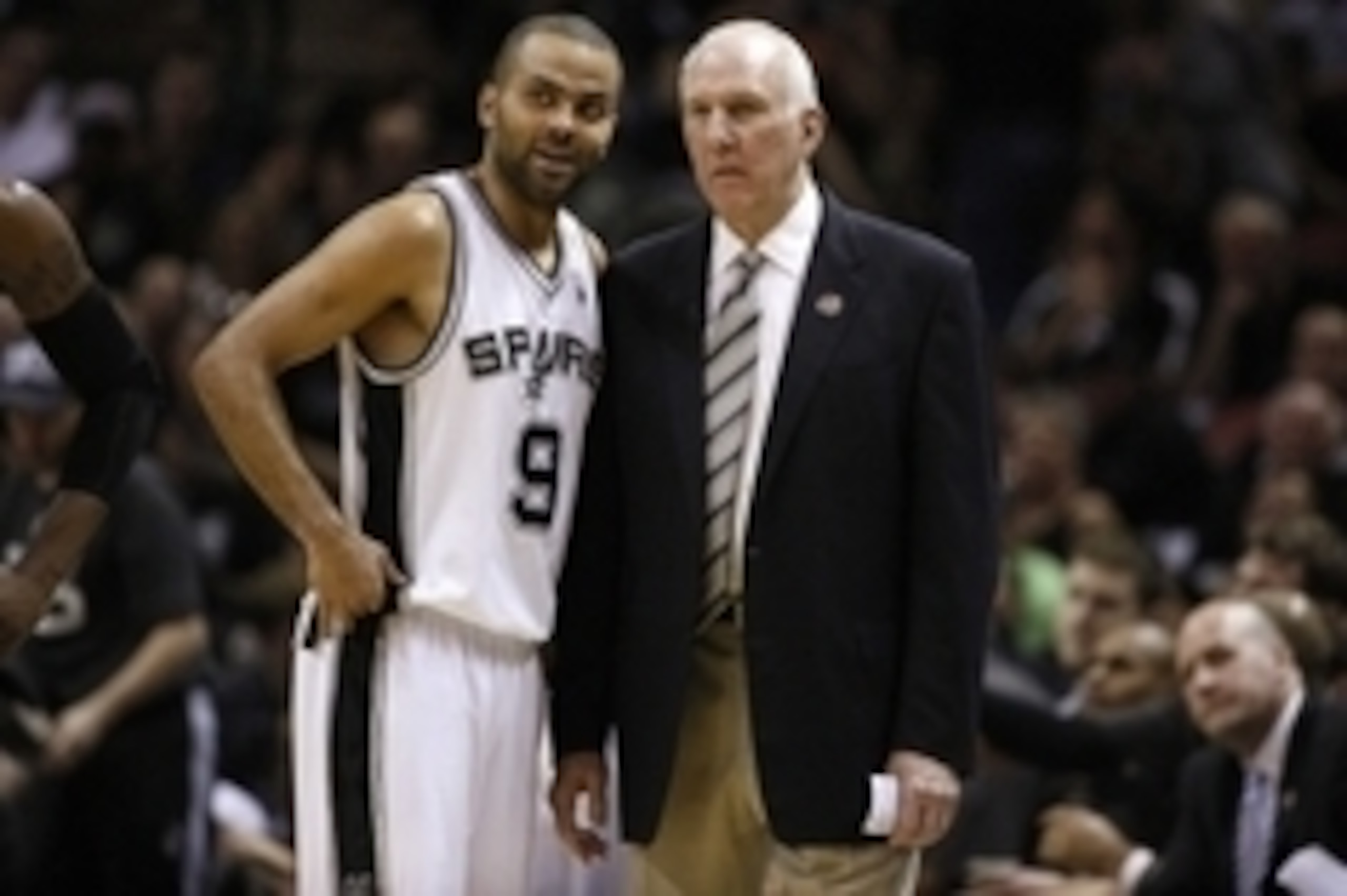 May 8, 2014; San Antonio, TX, USA; San Antonio Spurs guard Tony Parker (9) talks with head coach Gregg Popovich against the Portland Trail Blazers in game two of the second round of the 2014 NBA Playoffs at AT&T Center. Mandatory Credit: Soobum Im-USA TOD