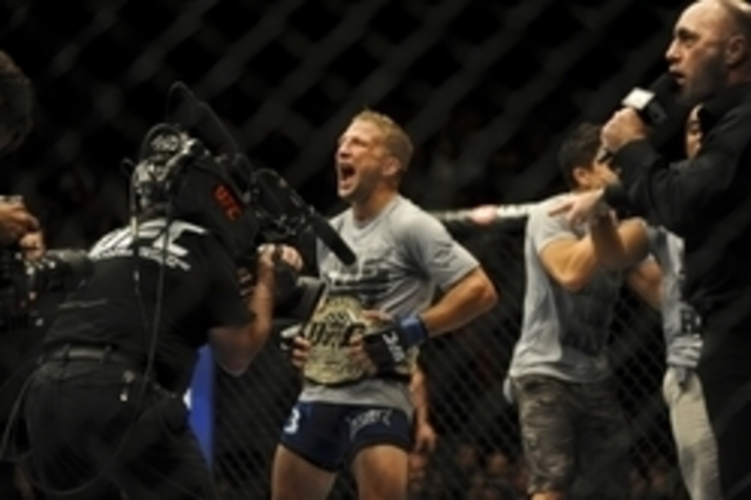 May 24, 2014; Las Vegas, NV, USA; New bantamweight champion TJ Dillashaw celebrates his TKO win over opponent Renan Barao (not pictured) following their UFC 173 bantamweight championship bout at MGM Grand Garden Arena. Mandatory Credit: Stephen R. Sylvan May 24, 2014; Las Vegas, NV, USA; New bantamweight champion TJ Dillashaw celebrates his TKO win over opponent Renan Barao (not pictured) following their UFC 173 bantamweight championship bout at MGM Grand Garden Arena. Mandatory Credit: Stephen R. Sylvan