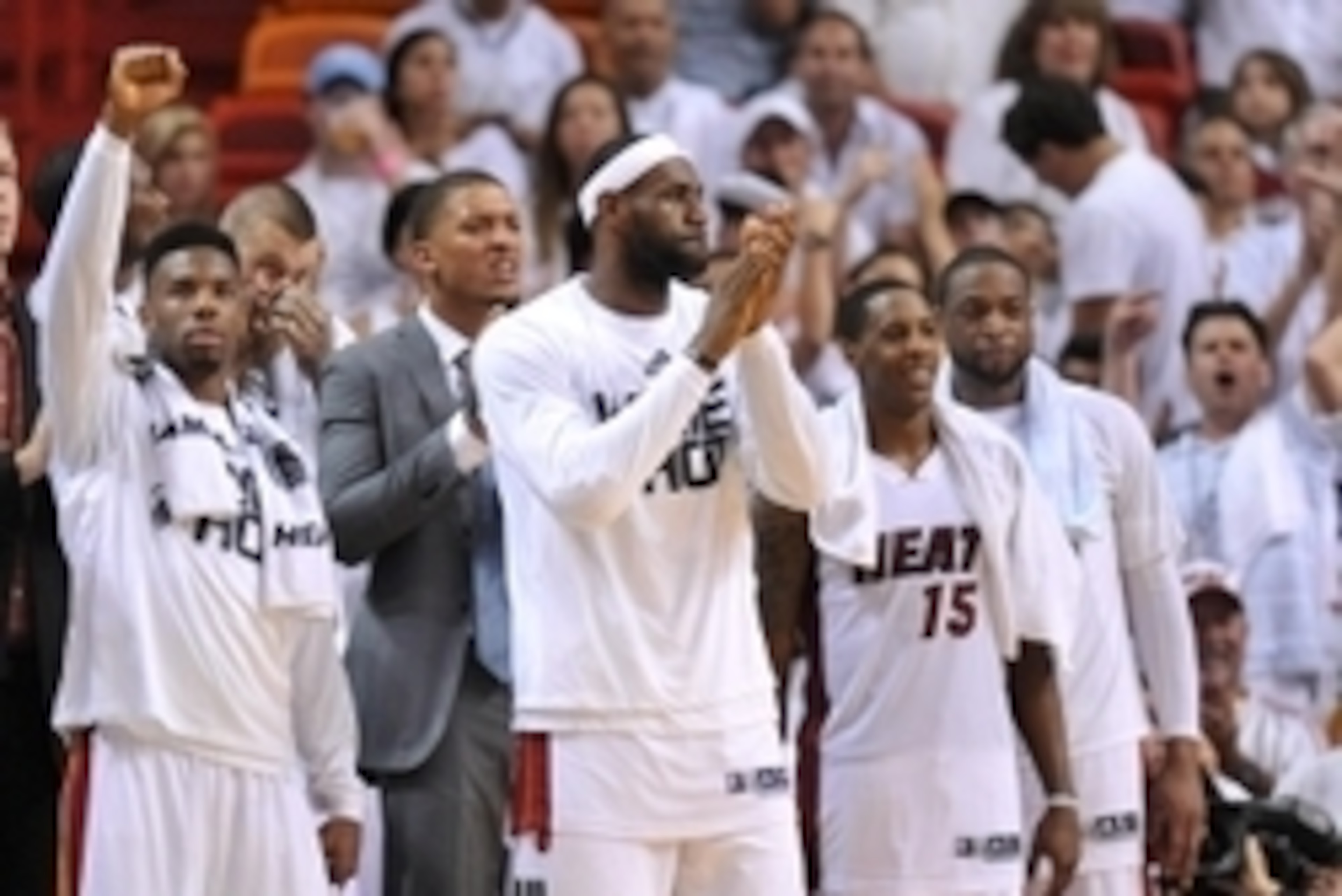 May 30, 2014; Miami, FL, USA; Miami Heat forward LeBron James (middle) leads teammates in celebration from the bench during the second half in game six of the Eastern Conference Finals of the 2014 NBA Playoffs against the Indiana Pacers at American Airlin May 30, 2014; Miami, FL, USA; Miami Heat forward LeBron James (middle) leads teammates in celebration from the bench during the second half in game six of the Eastern Conference Finals of the 2014 NBA Playoffs against the Indiana Pacers at American Airlin