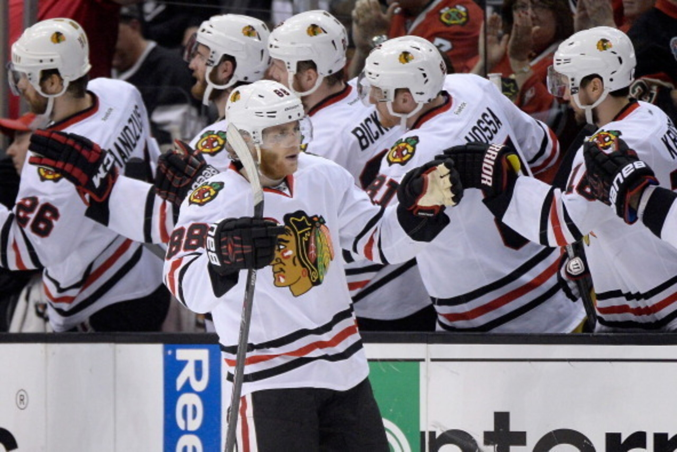 LOS ANGELES, CA - MAY 30:  Patrick Kane #88 of the Chicago Blackhawks celebrates with teammates after scoring a second period goal in Game Six of the Western Conference Final during the 2014 Stanley Cup Playoffs at Staples Center on May 30, 2014 in Los An