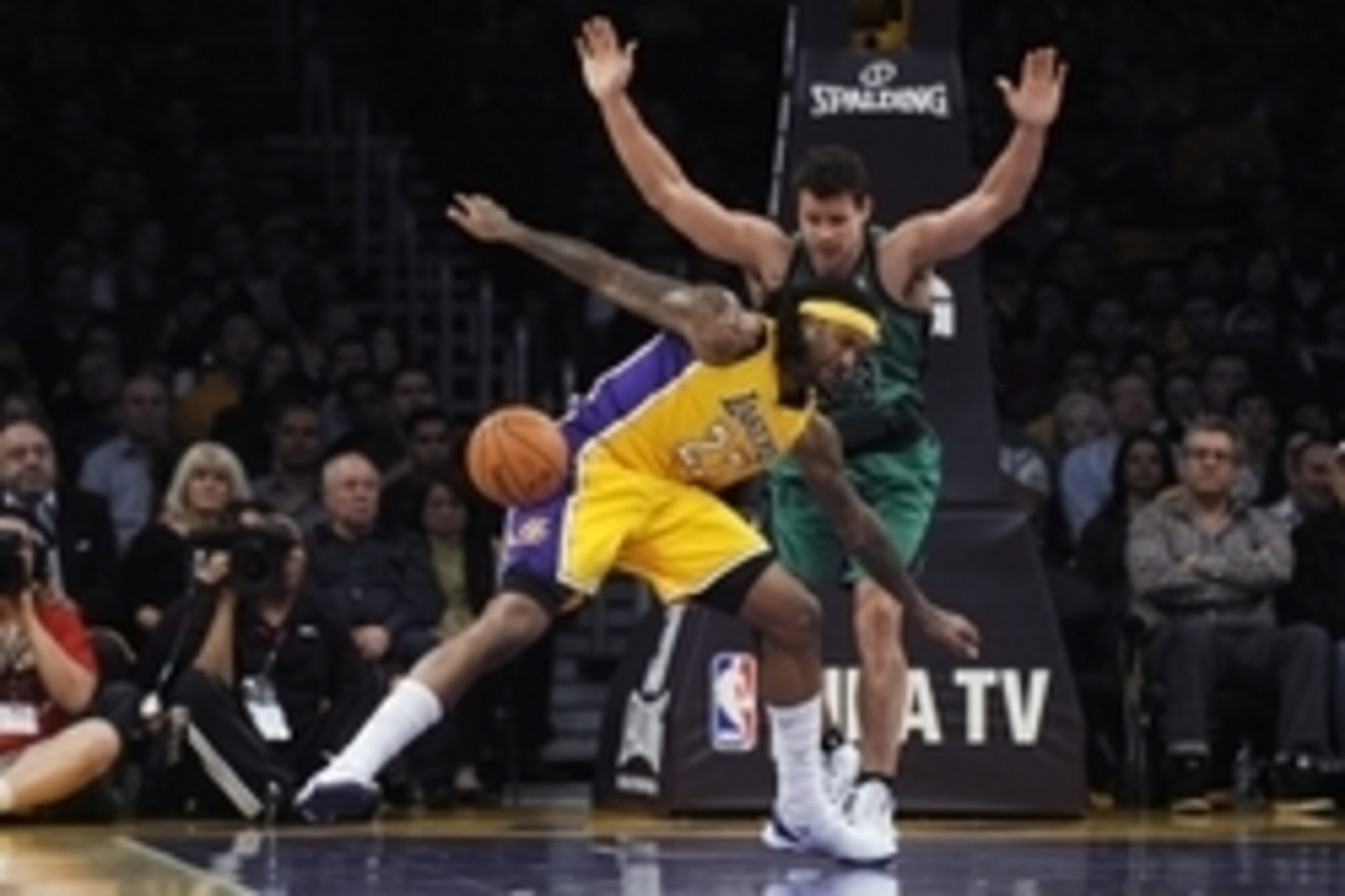Feb 21, 2014; Los Angeles, CA, USA; Los Angeles Lakers center Jordan Hill (27) loses control of the ball in front of Boston Celtics forward Kris Humphries (43) during the second quarter at Staples Center. Mandatory Credit: Kelvin Kuo-USA TODAY Sports Feb 21, 2014; Los Angeles, CA, USA; Los Angeles Lakers center Jordan Hill (27) loses control of the ball in front of Boston Celtics forward Kris Humphries (43) during the second quarter at Staples Center. Mandatory Credit: Kelvin Kuo-USA TODAY Sports