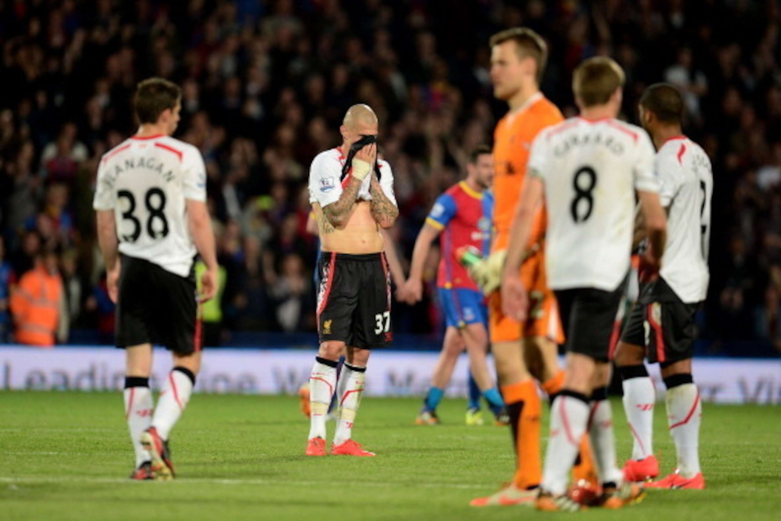 LONDON, ENGLAND - MAY 05:  A dejected Martin Skrtel of Liverpool reacts following his team's 3-3 draw during the Barclays Premier League match between Crystal Palace and Liverpool at Selhurst Park on May 5, 2014 in London, England.  (Photo by Jamie McDona