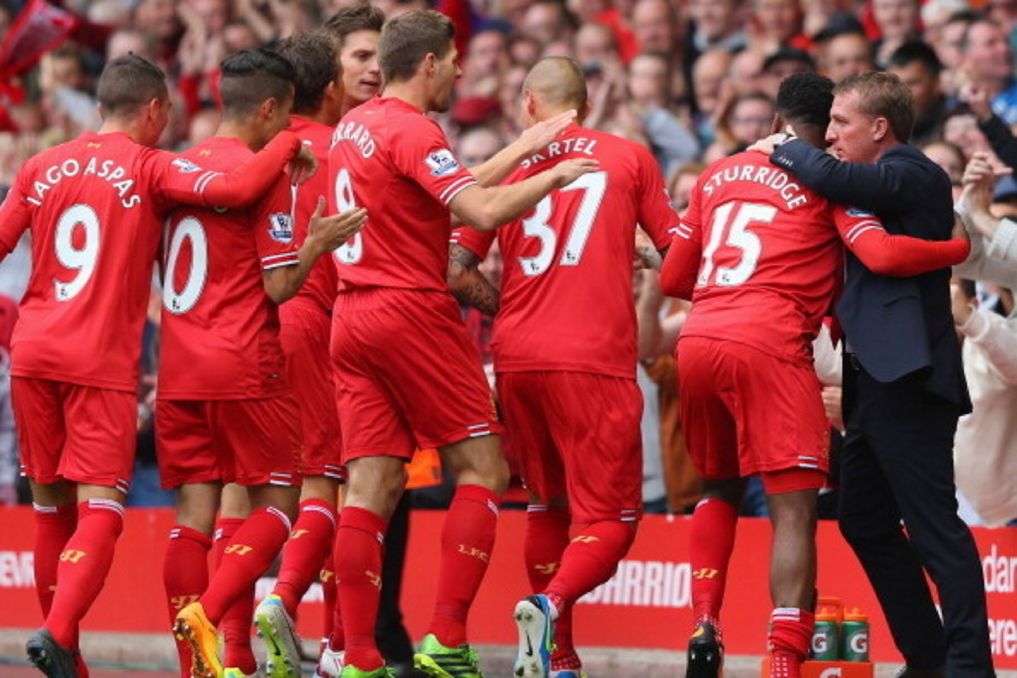 LIVERPOOL, ENGLAND - SEPTEMBER 01:  Daniel Sturridge of Liverpool celebrates scoring the opening goal with Manager Brendan Rodgers during the Barclays Premier League match between Liverpool and Manchester United at Anfield on September 01, 2013 in Liverpo