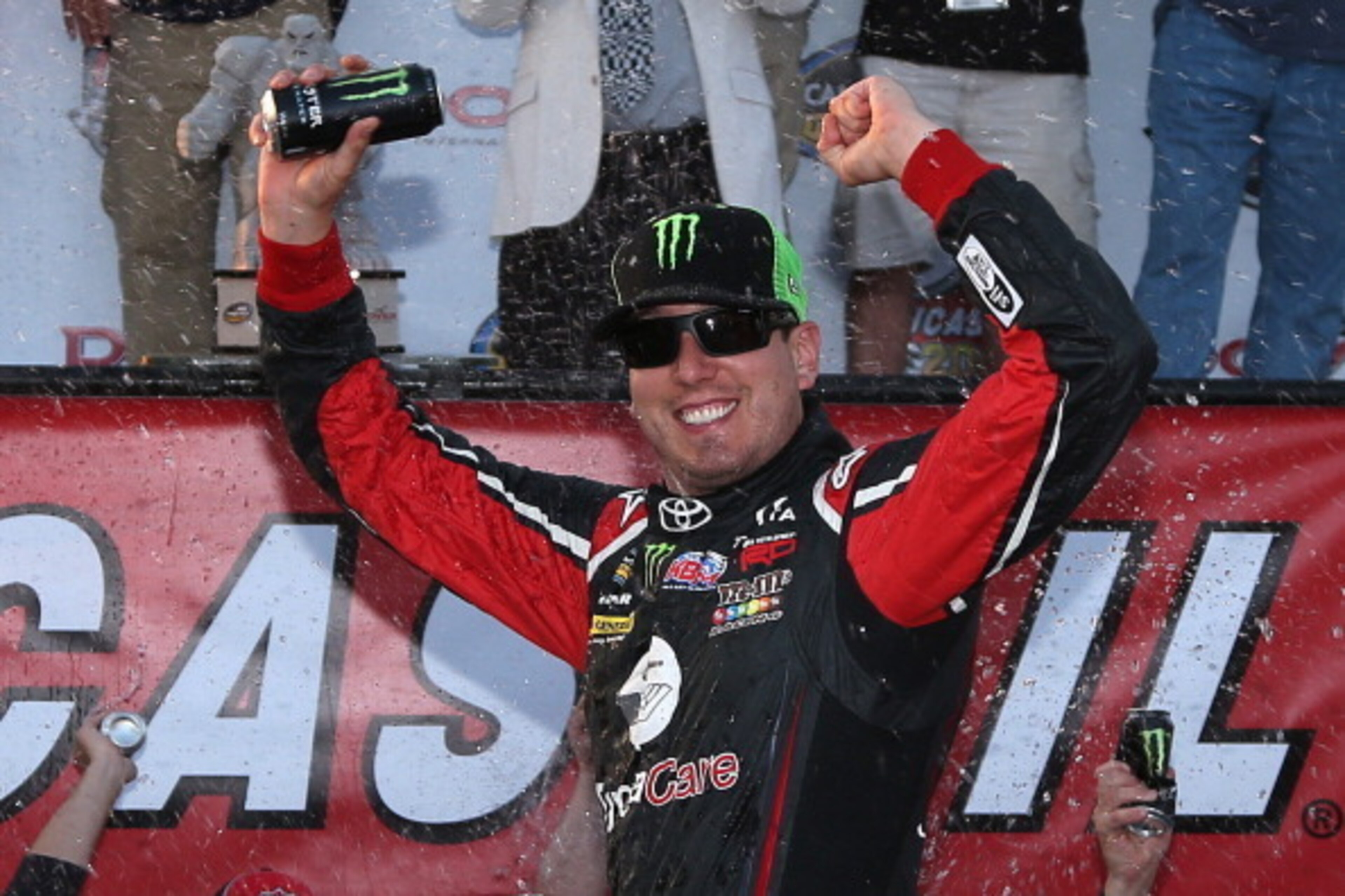 DOVER, DE - MAY 30: Kyle Busch, driver of the #51 Betty Jane France Humanitarian Award Toyota, celebrates in victory lane after winning the NASCAR Camping World Truck Series Lucas Oil 200 at Dover International Speedway on May 30, 2014 in Dover, Delaware DOVER, DE - MAY 30: Kyle Busch, driver of the #51 Betty Jane France Humanitarian Award Toyota, celebrates in victory lane after winning the NASCAR Camping World Truck Series Lucas Oil 200 at Dover International Speedway on May 30, 2014 in Dover, Delaware