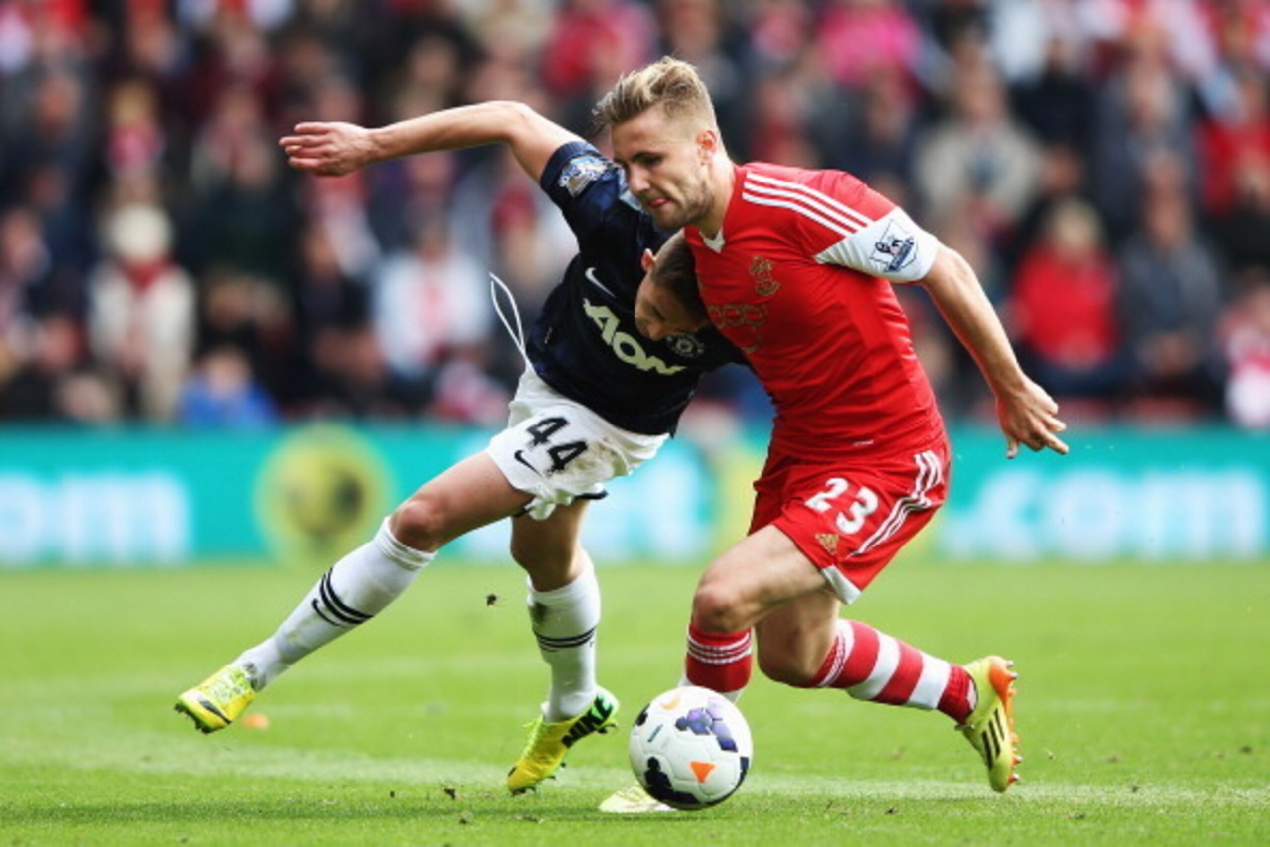 SOUTHAMPTON, ENGLAND - MAY 11:  (L-R) Adnan Januzaj of Manchester United and Luke Shaw of Southampton challenge for the ball during the Barclays Premier League match between Southampton and Manchester United at St Mary's Stadium on May 11, 2014 in Southam