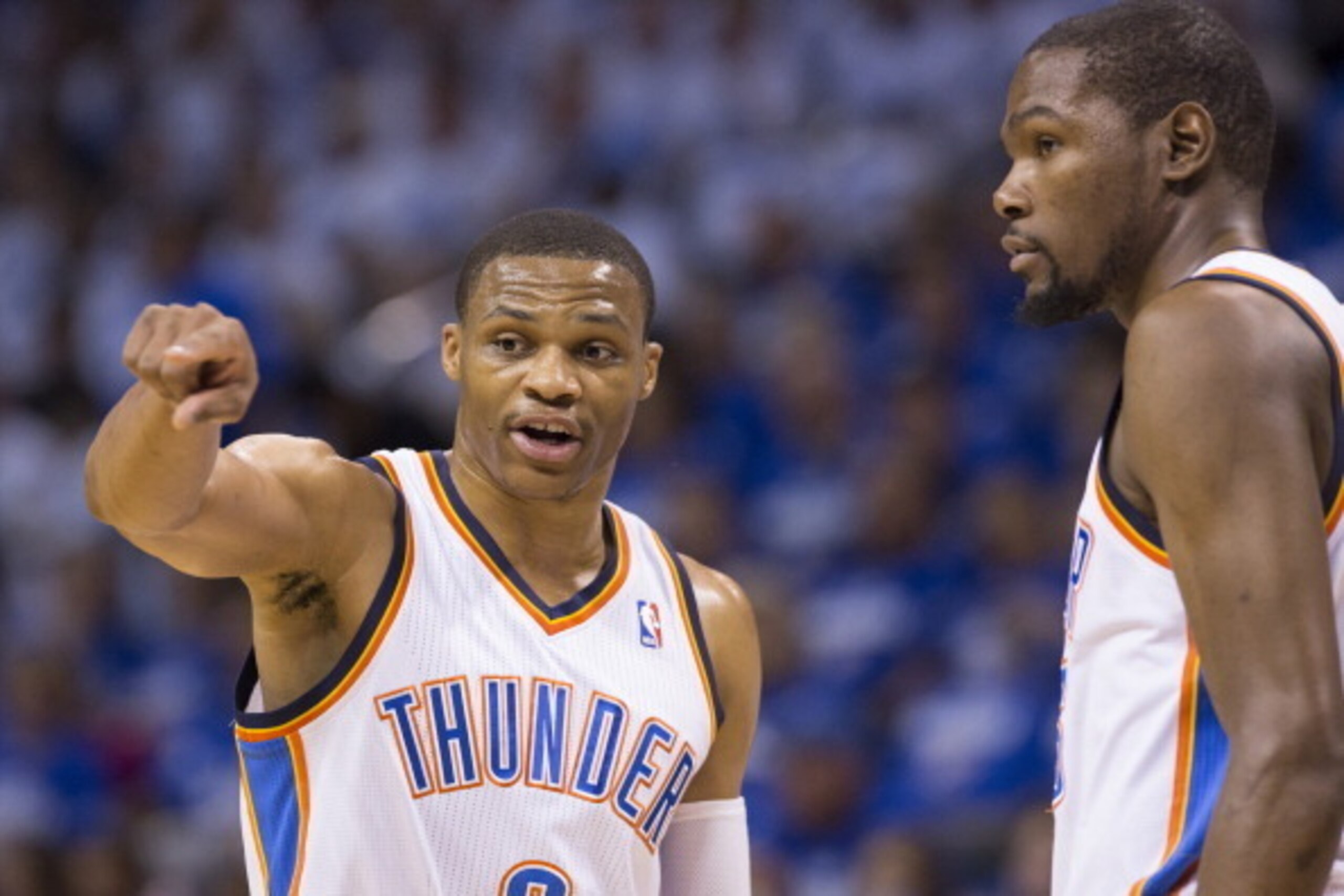 OKLAHOMA CITY, OK - May 27:  Kevin Durant #35 and Russell Westbrook #0 of the Oklahoma City Thunder look on against the San Antonio Spurs in Game 4 of the Western Conference Finals during the 2014 NBA Playoffs at the Chesapeake Arena on May 27, 2014 in Ok