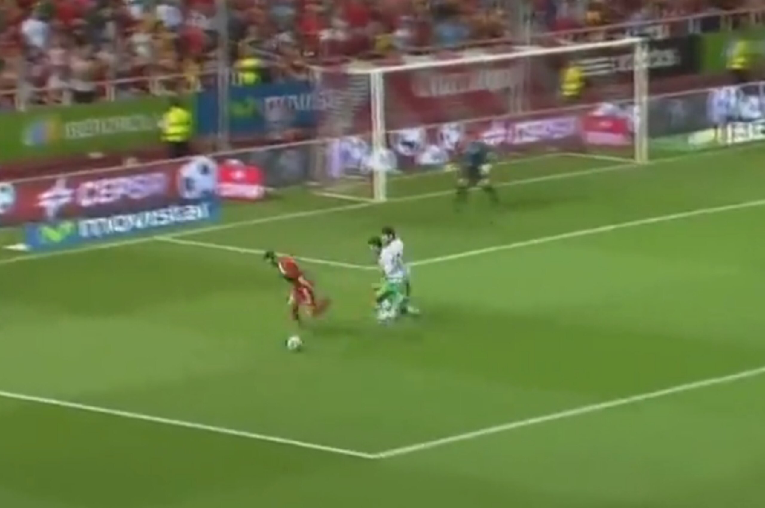 Torres heads wide of goal.