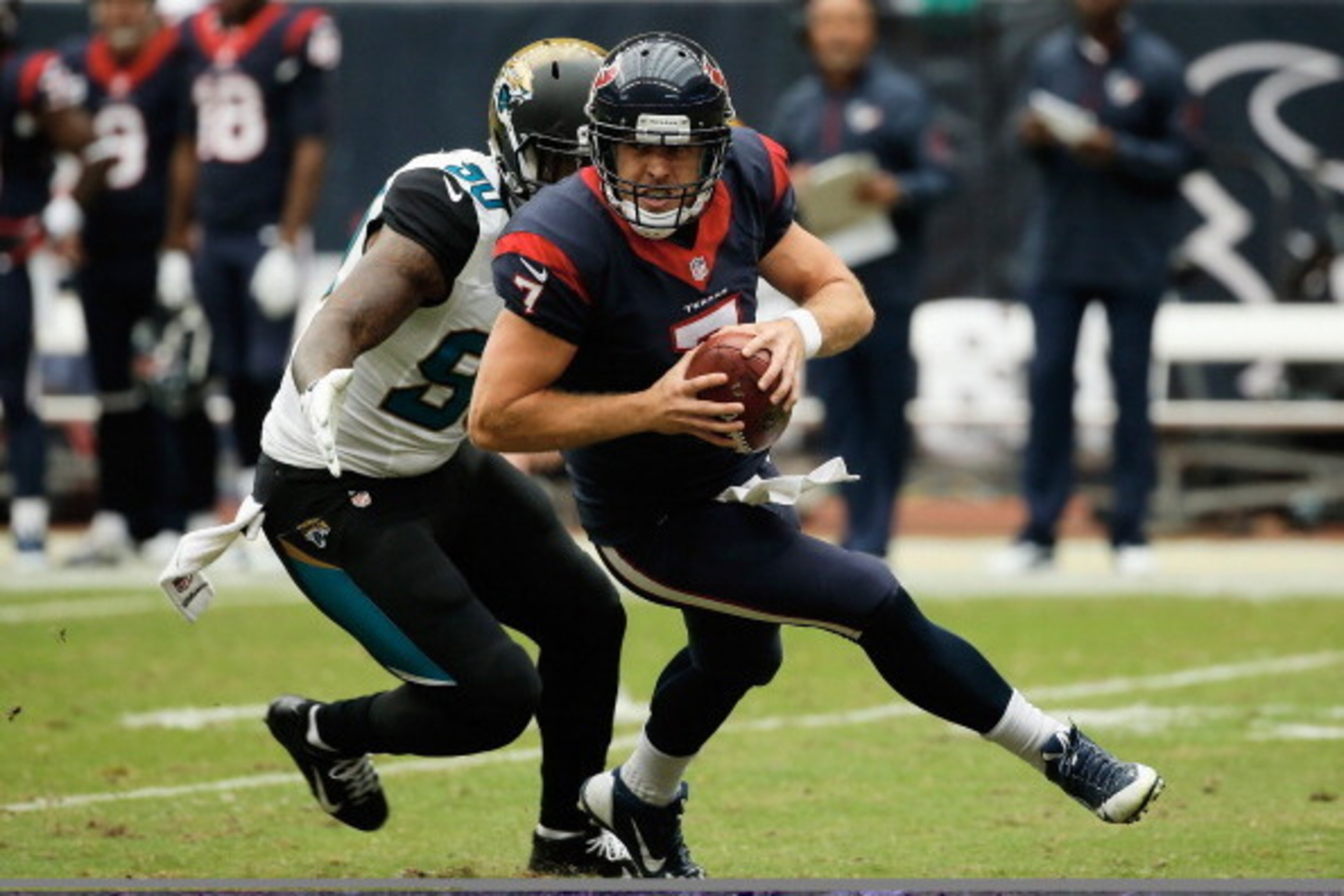 HOUSTON, TX - NOVEMBER 24:  Case Keenum #7 of the Houston Texans is sacked by Andre Branch #90 of the Jacksonville Jaguars  in the first half at Reliant Stadium on November 24, 2013 in Houston, Texas.  (Photo by Scott Halleran/Getty Images)